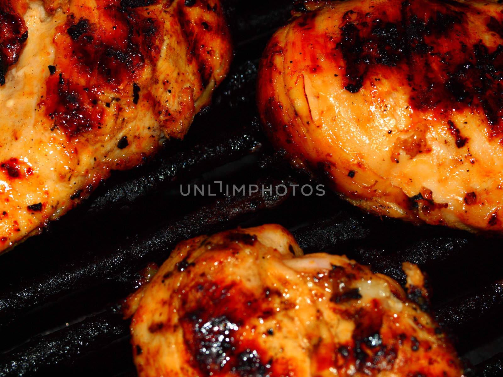 Fresh Grilled Chicken Breasts on the Barbecue by Frankljunior