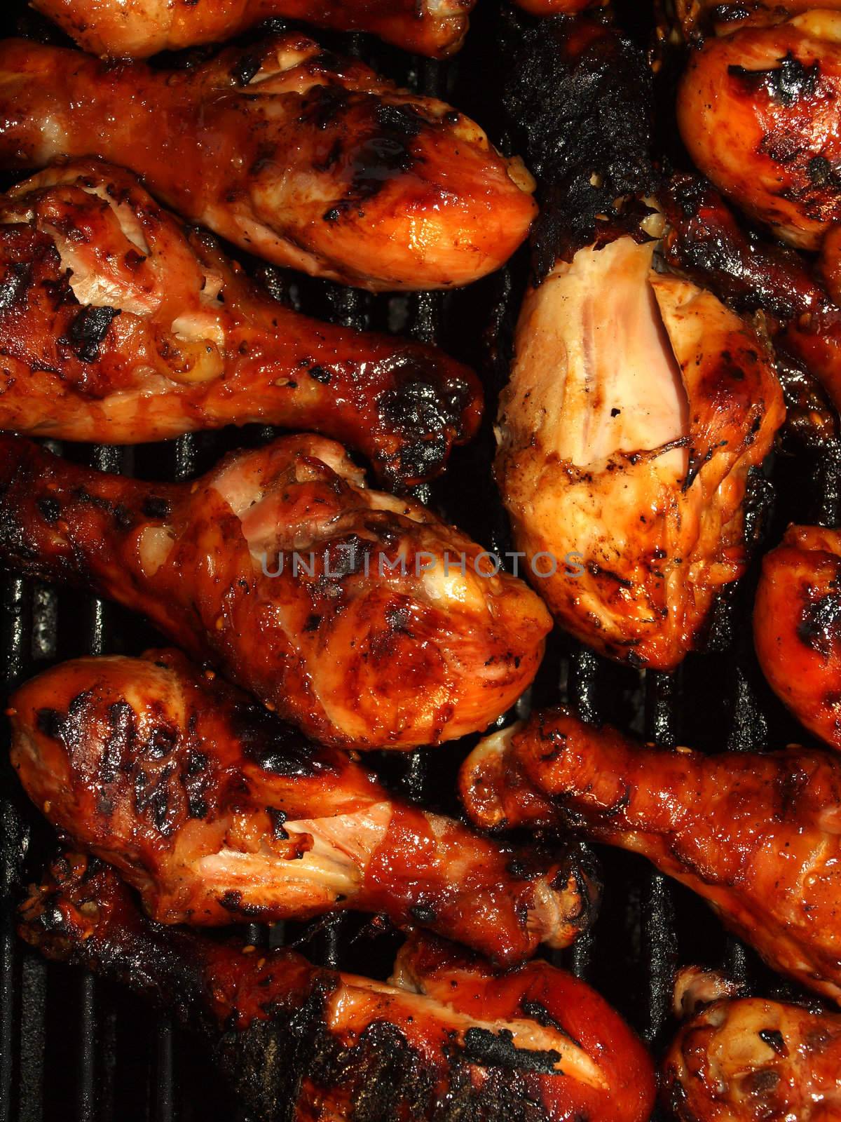 Fresh Grilled Chicken Cooking on the Barbecue by Frankljunior