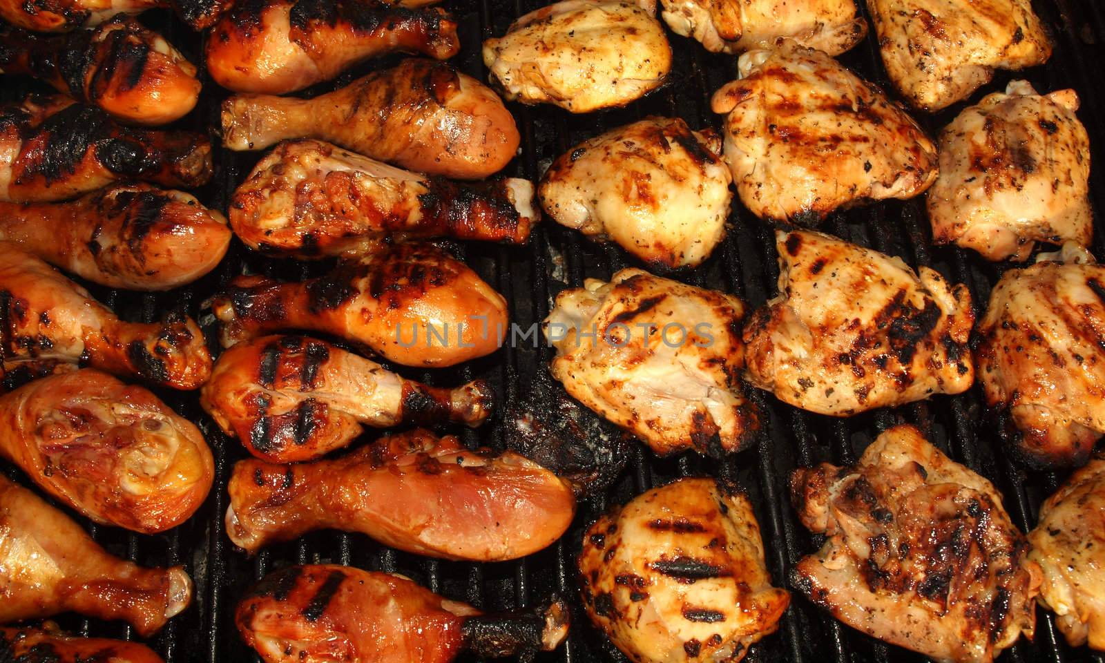Fresh Grilled Chicken Cooking on the Barbecue by Frankljunior