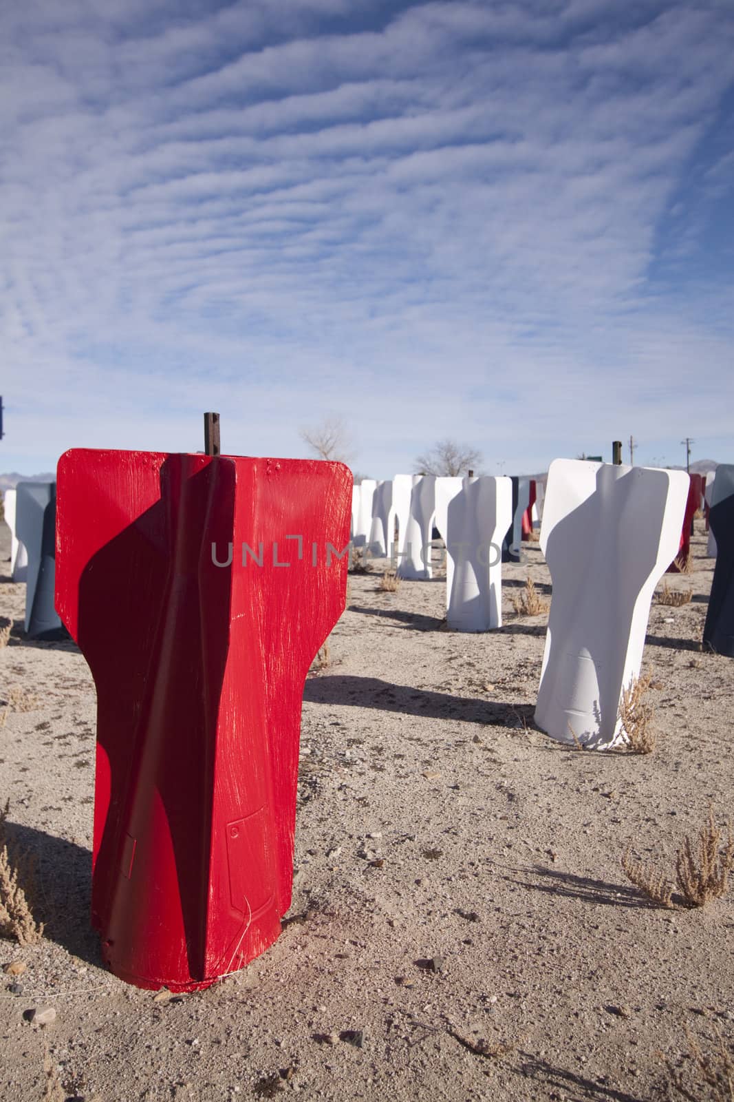 Red white and blue missile bombs in the desert.