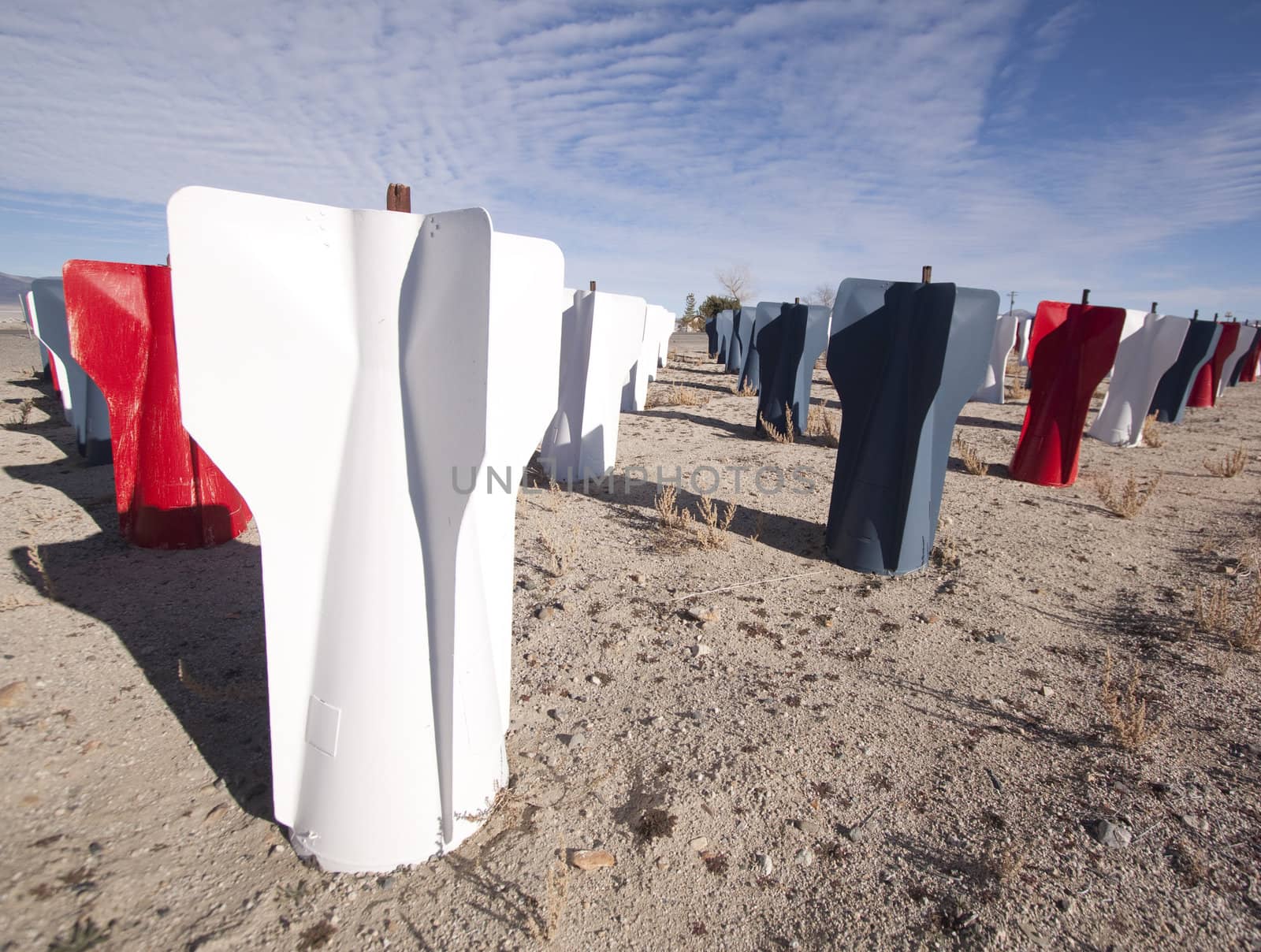 Red white and blue missile bombs in the desert.