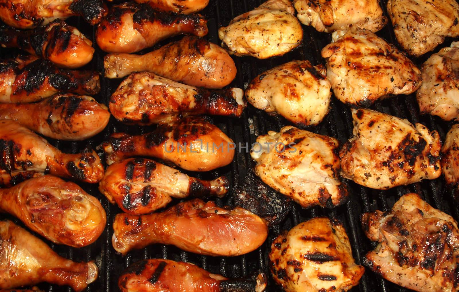 Fresh Grilled Chicken Cooking on the Barbecue by Frankljunior