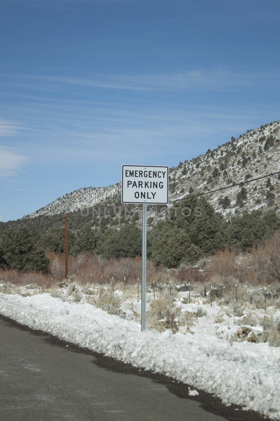 Open road with snow  by jeremywhat