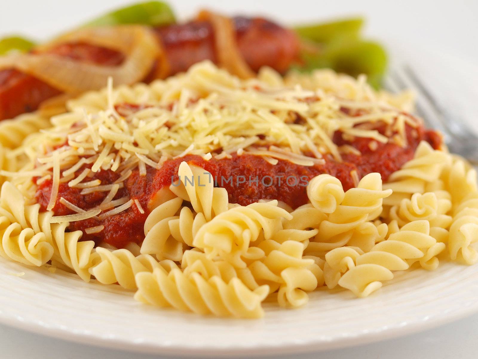 Rotini Pasta with Tomato Sauce, Cheese, and Sausage with Peppers and Onions    