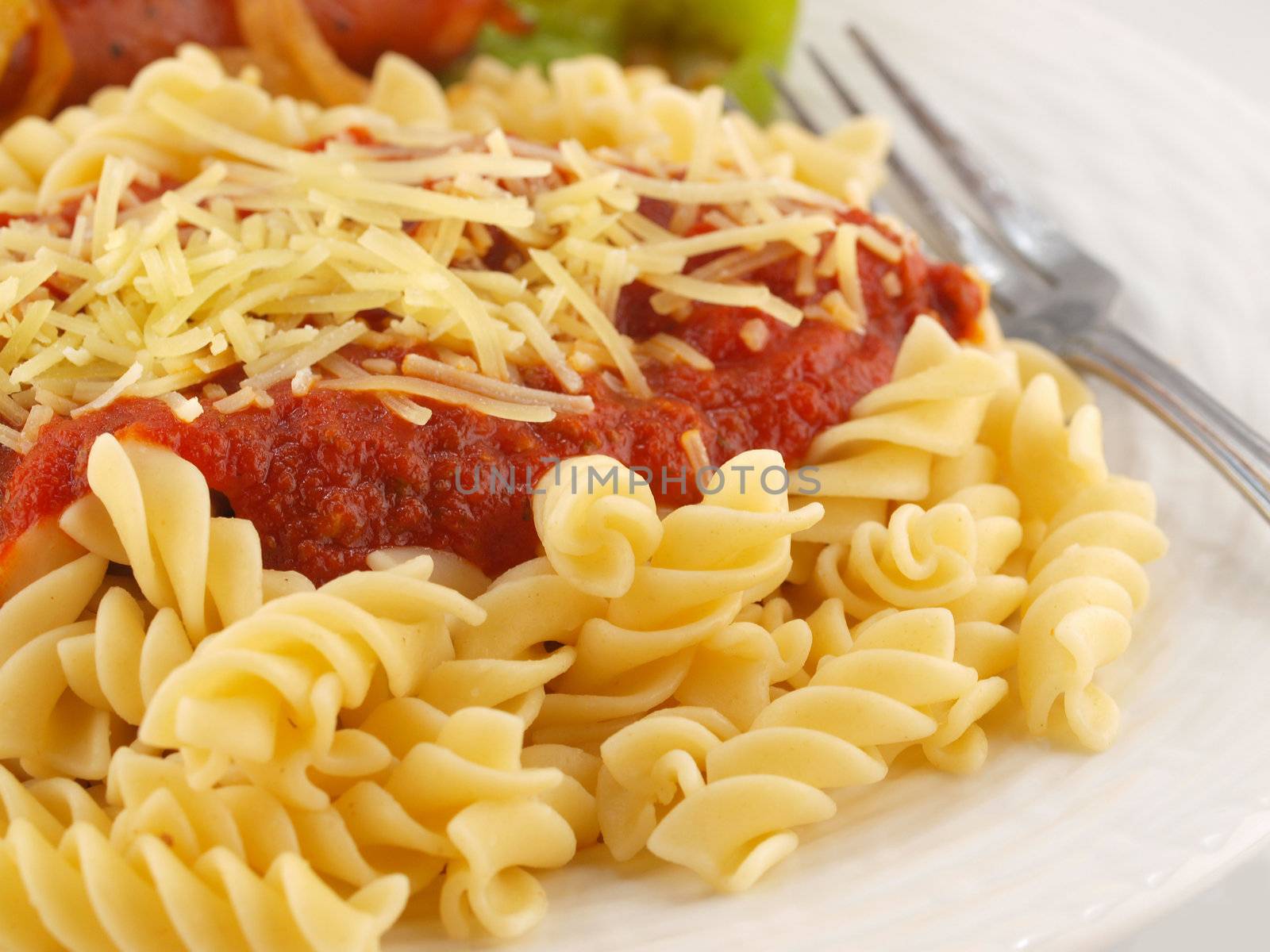 Rotini Pasta with Tomato Sauce, Cheese, and Sausage with Peppers and Onions    