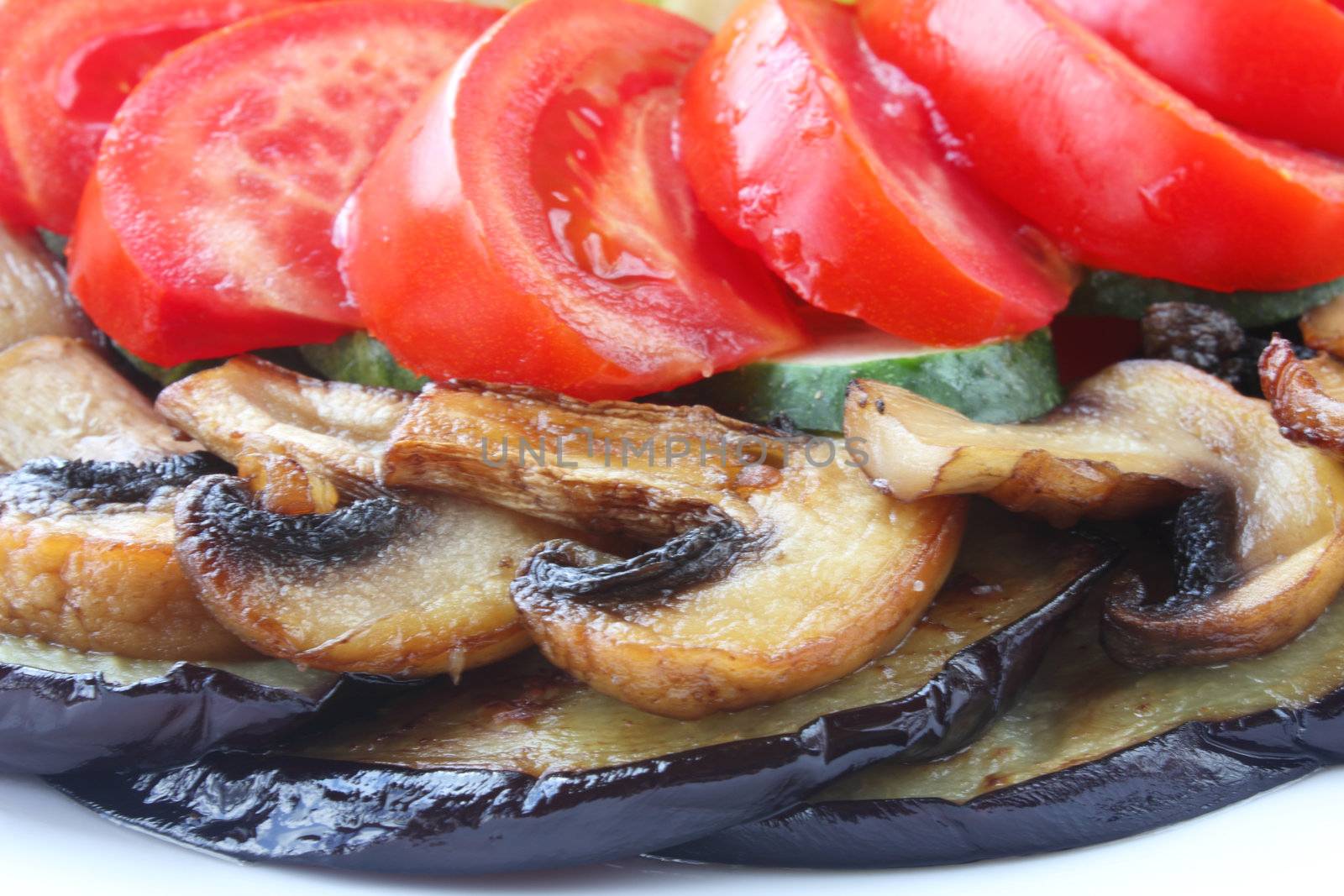 Roasted mushrooms with eggplant, tomato and cucumber