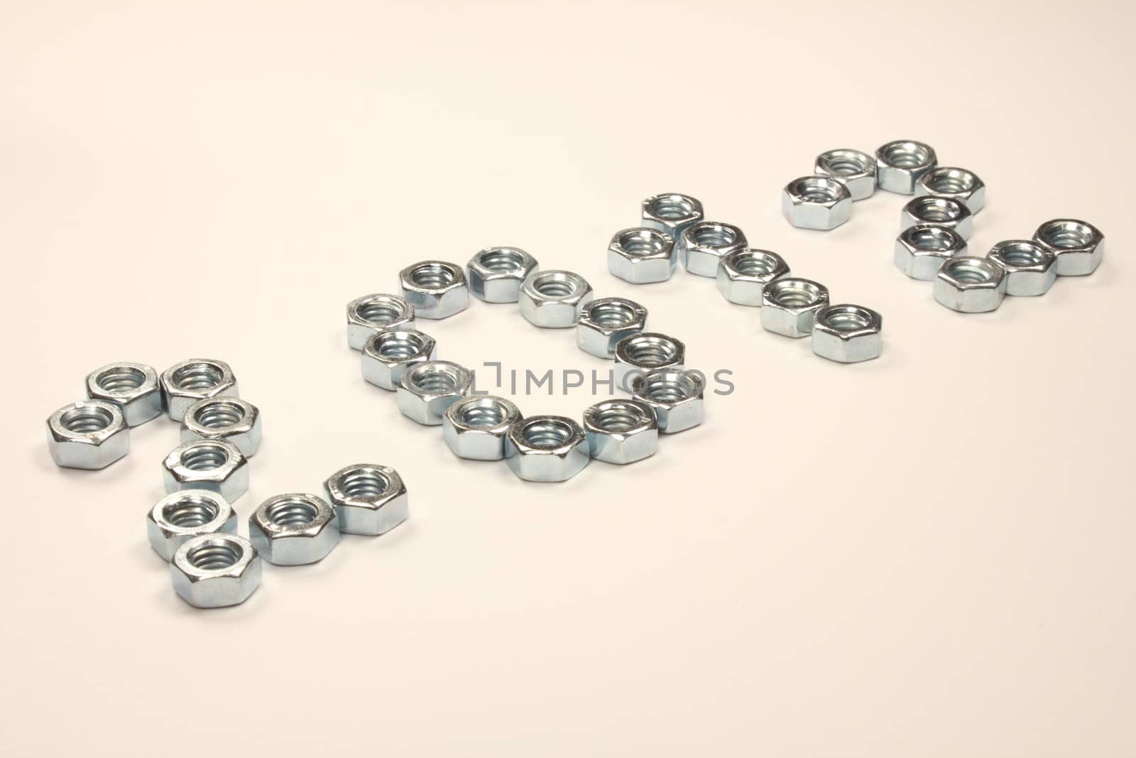 Digits 2012 of nuts on white background
