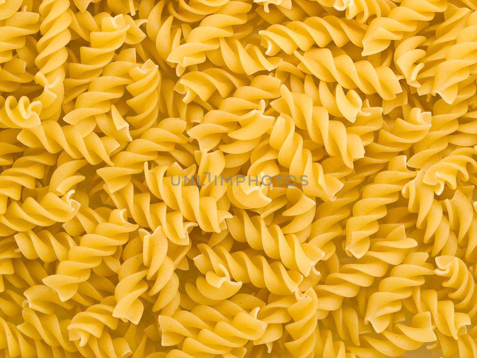 Closeup of Uncooked Italian Spiral Pasta - Rotini