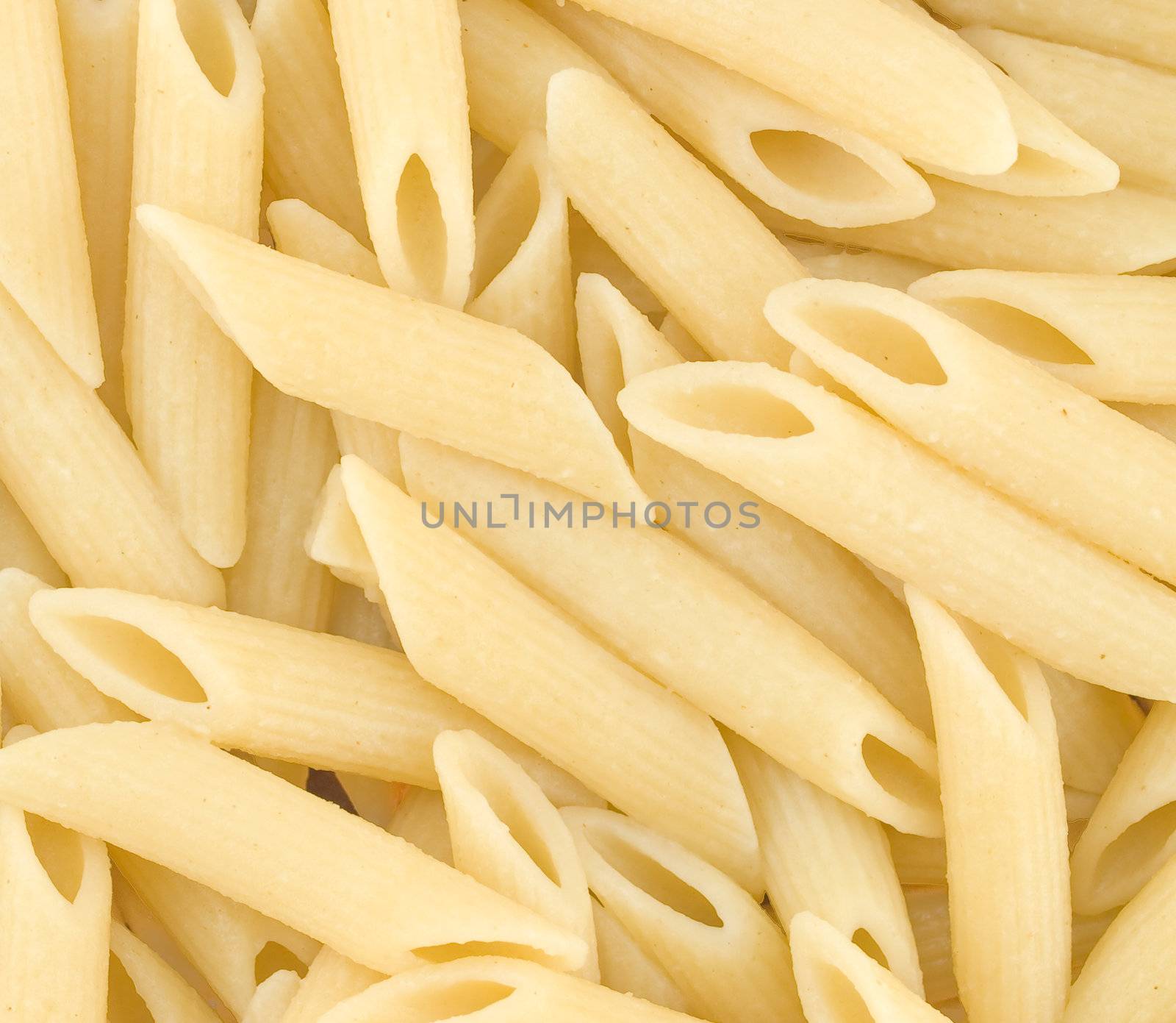 Closeup Background of Cooked Italian Penne Pasta