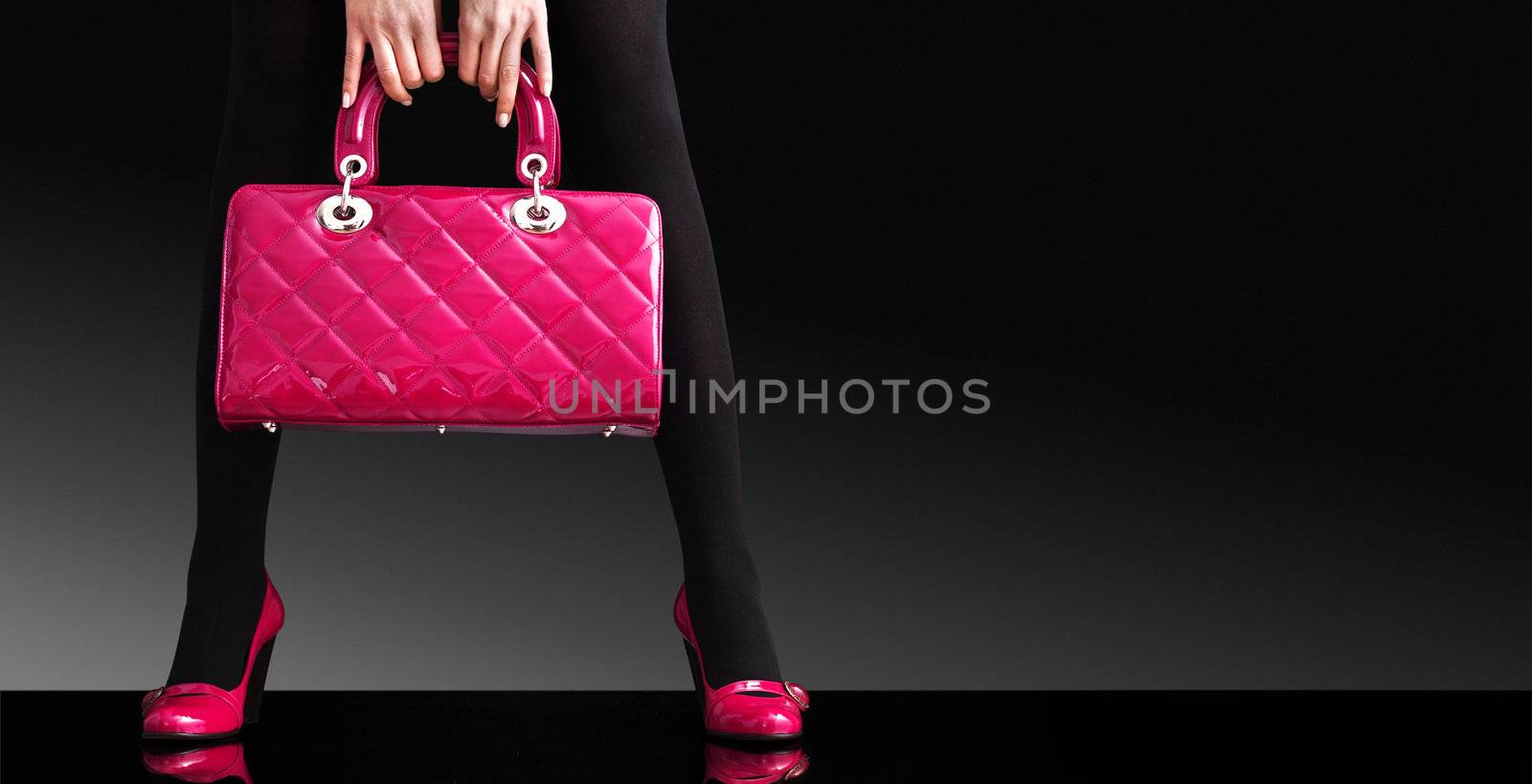 fashionable woman with a pink bag,fashion photo