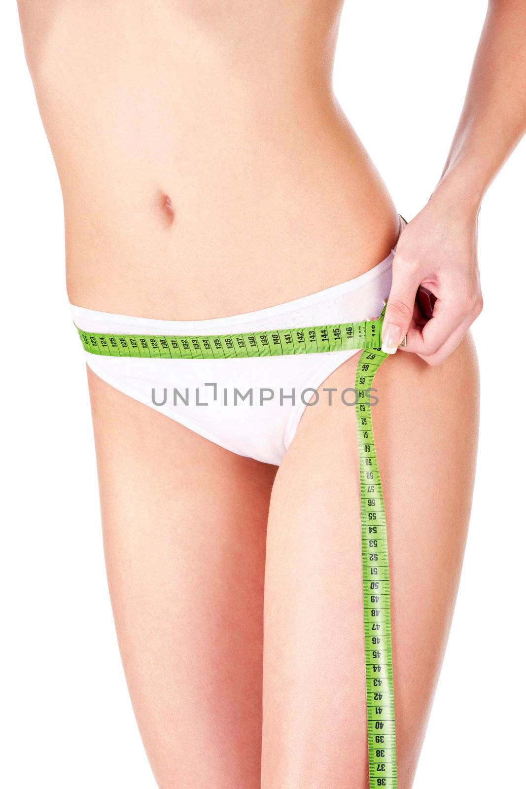 Measure tape around slim woman's hip, isolated on white. Health concept 