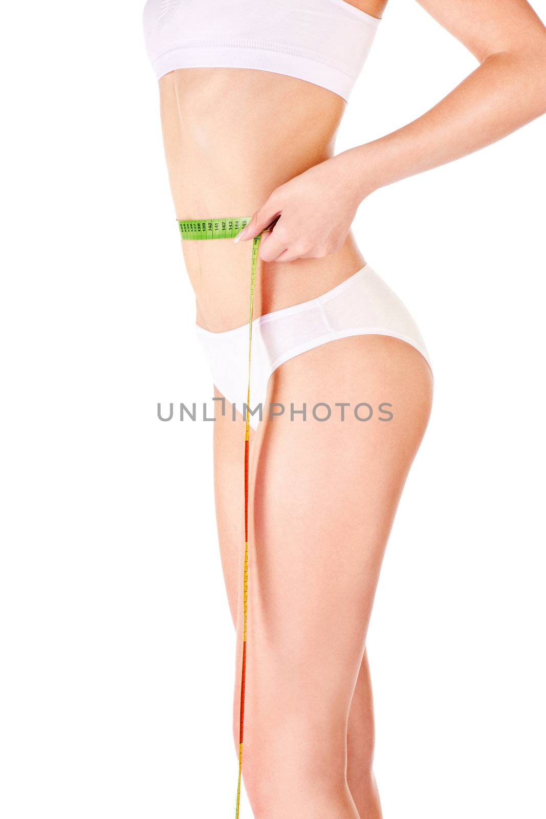 Measure tape around slim woman's waist, isolated on white. Health concept 