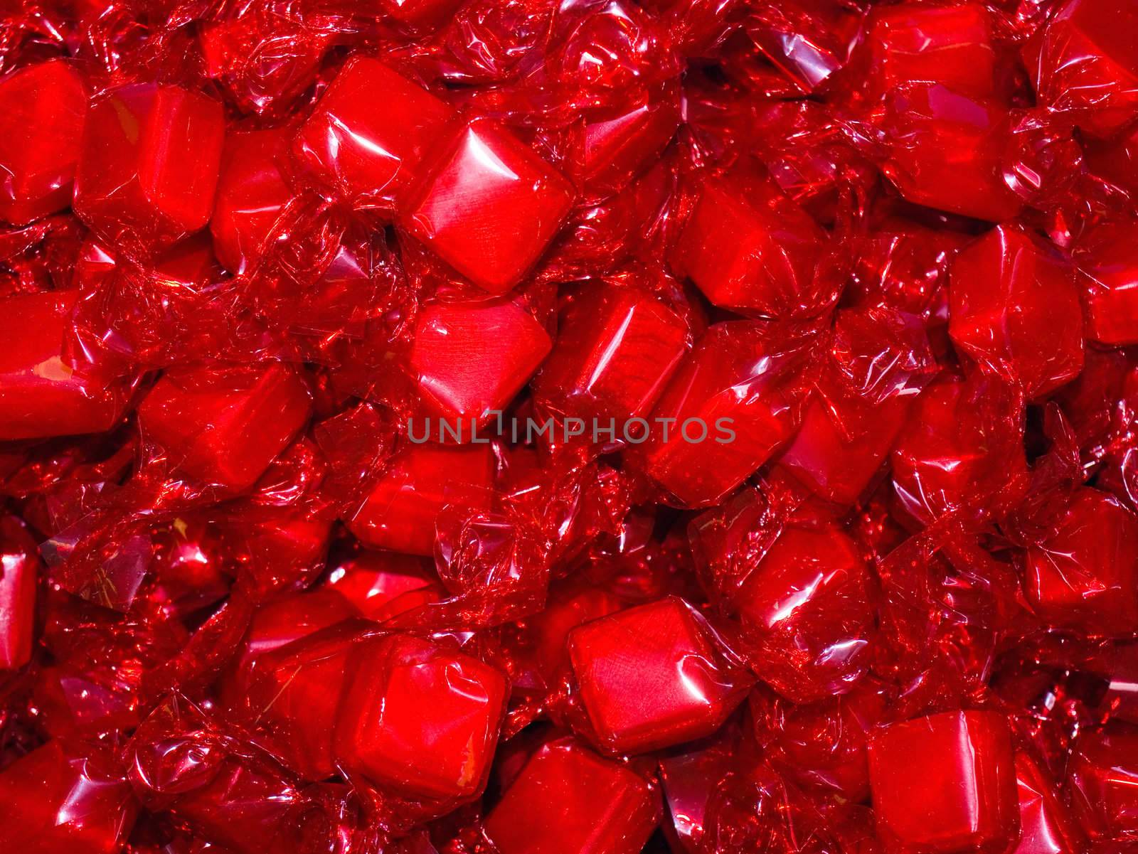 Colorful Hard Candy in Wrappers as a Background