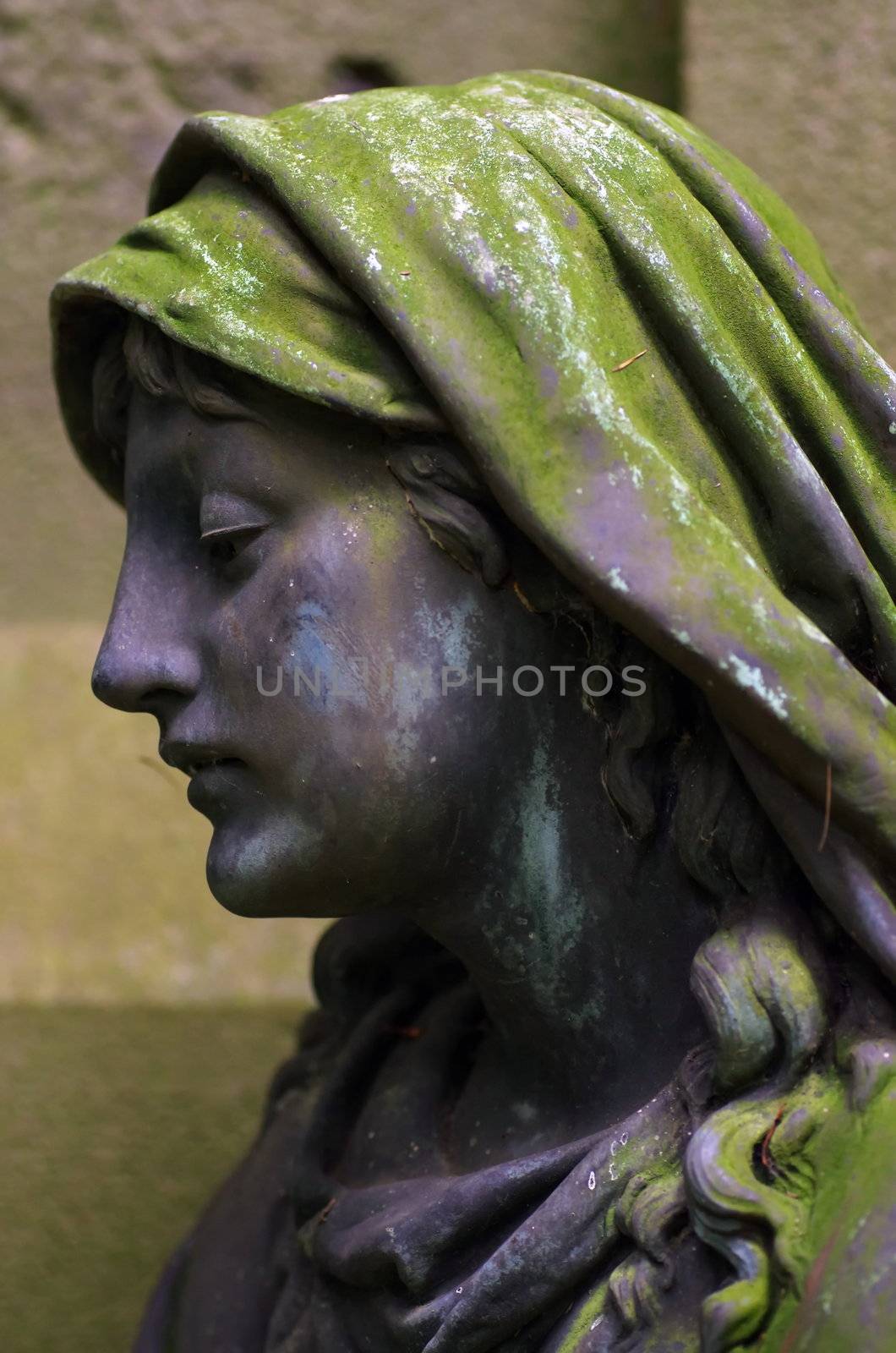 detail of an old marble tombstone