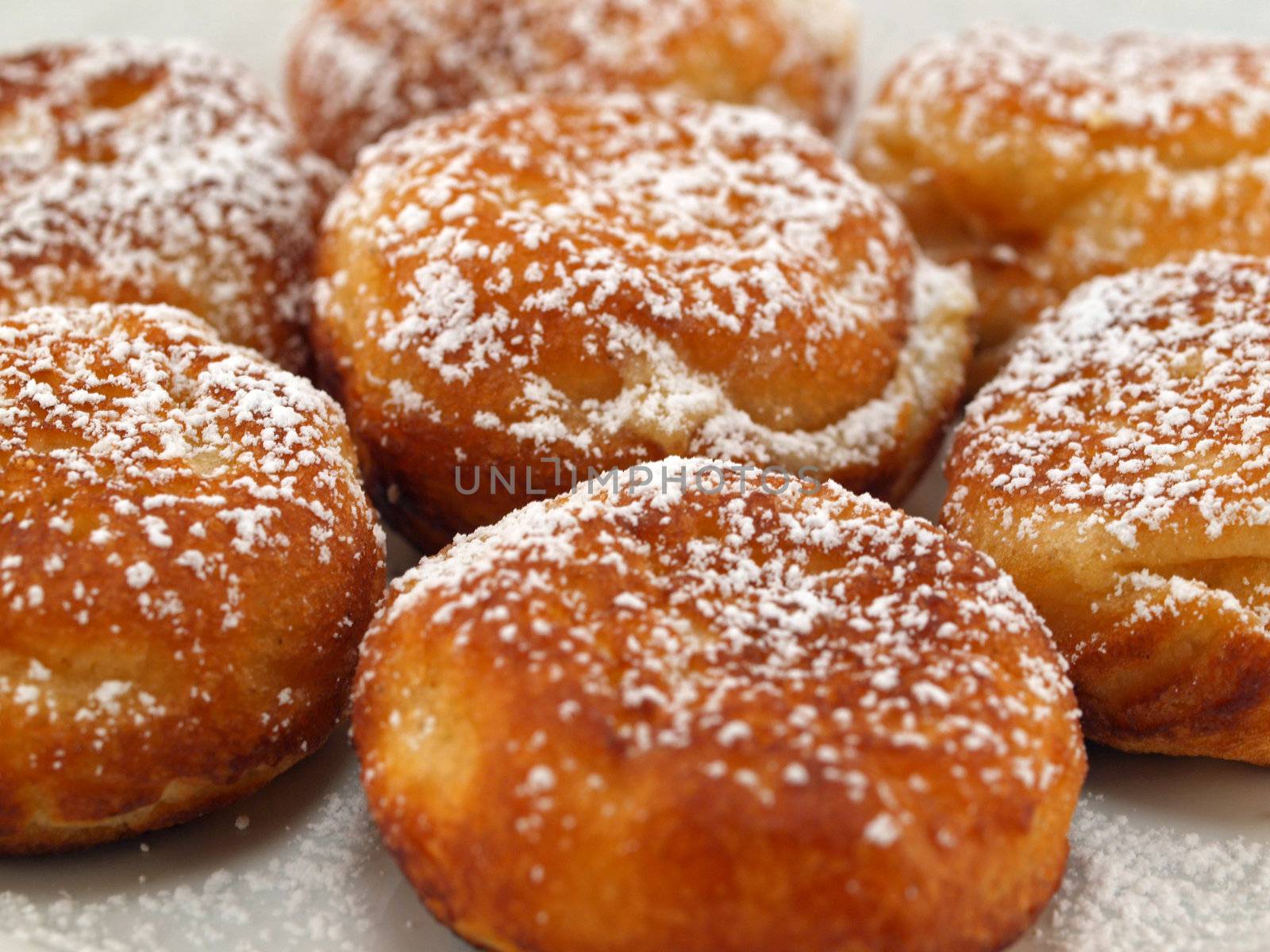 A Plate of Freshly Made Aebelskivers with Powdered Sugar