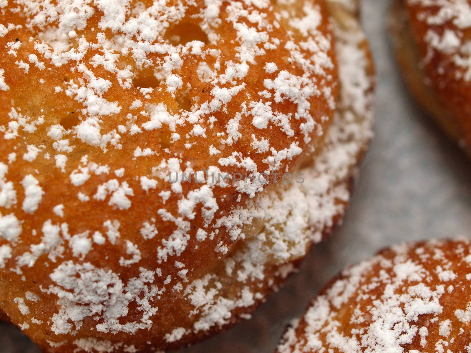 A Plate of Freshly Made Aebelskivers with Powdered Sugar