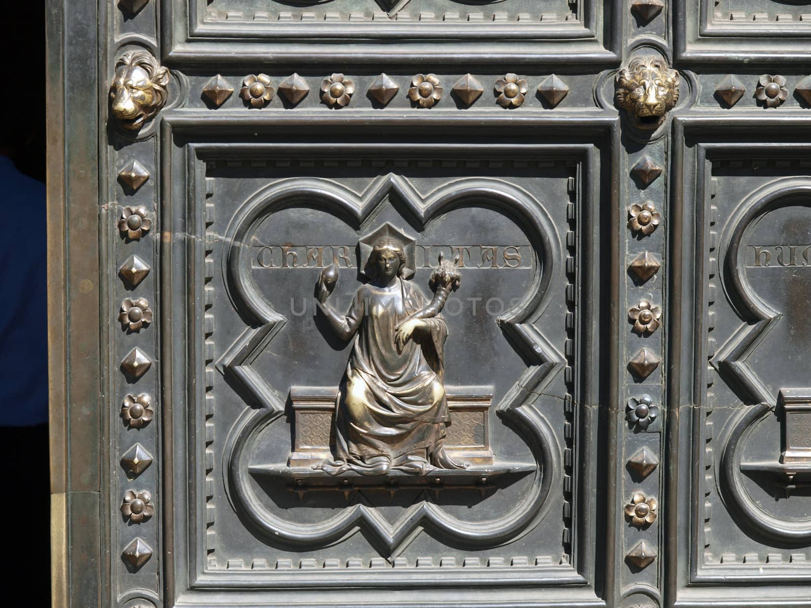 Florence Baptistery - South Portal by Andrea Pisano- 1336. Histories of St John the Baptist - Charity