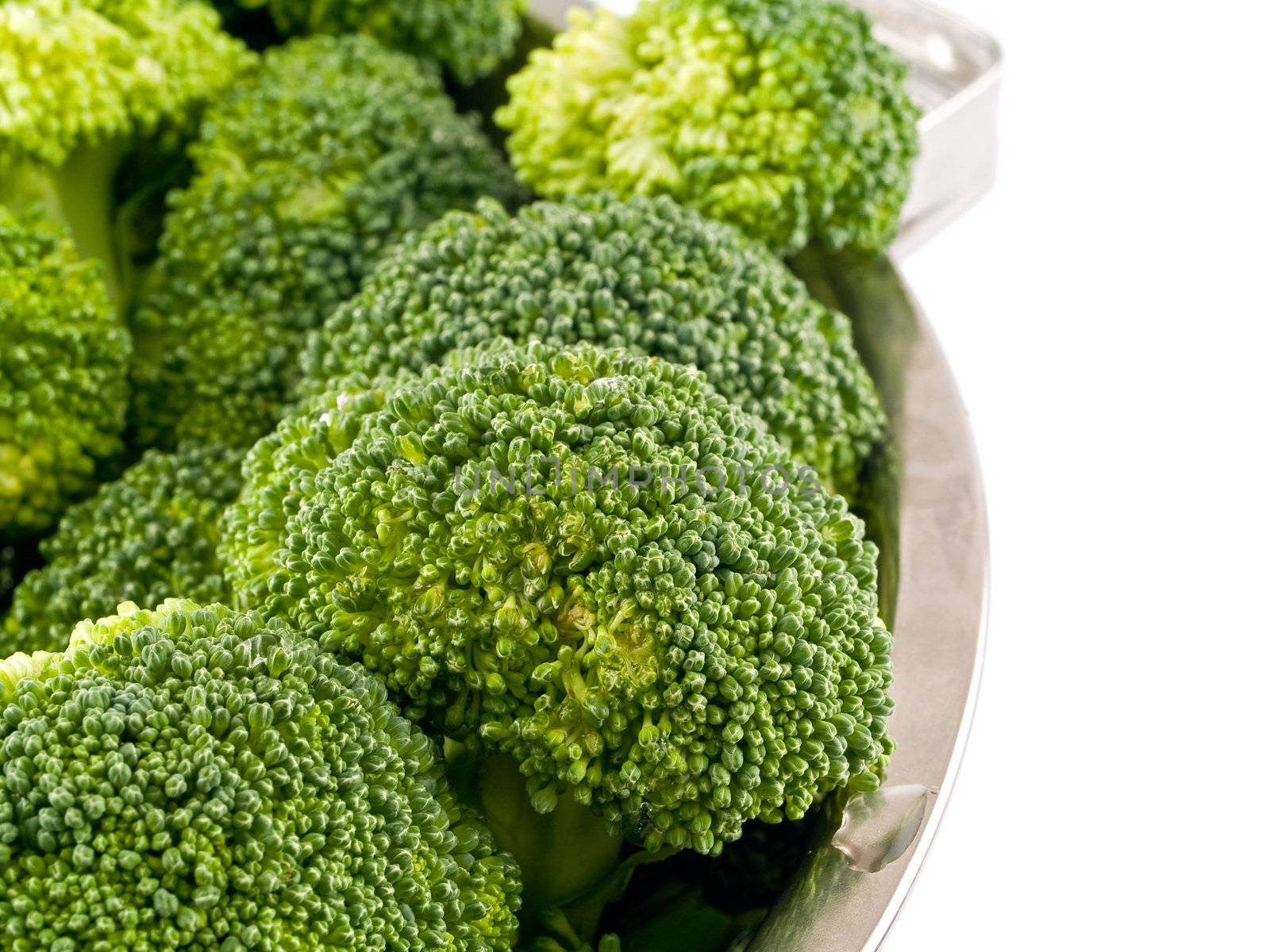 Fresh, Raw, Green Broccoli Pieces, Cut and Ready to Eat