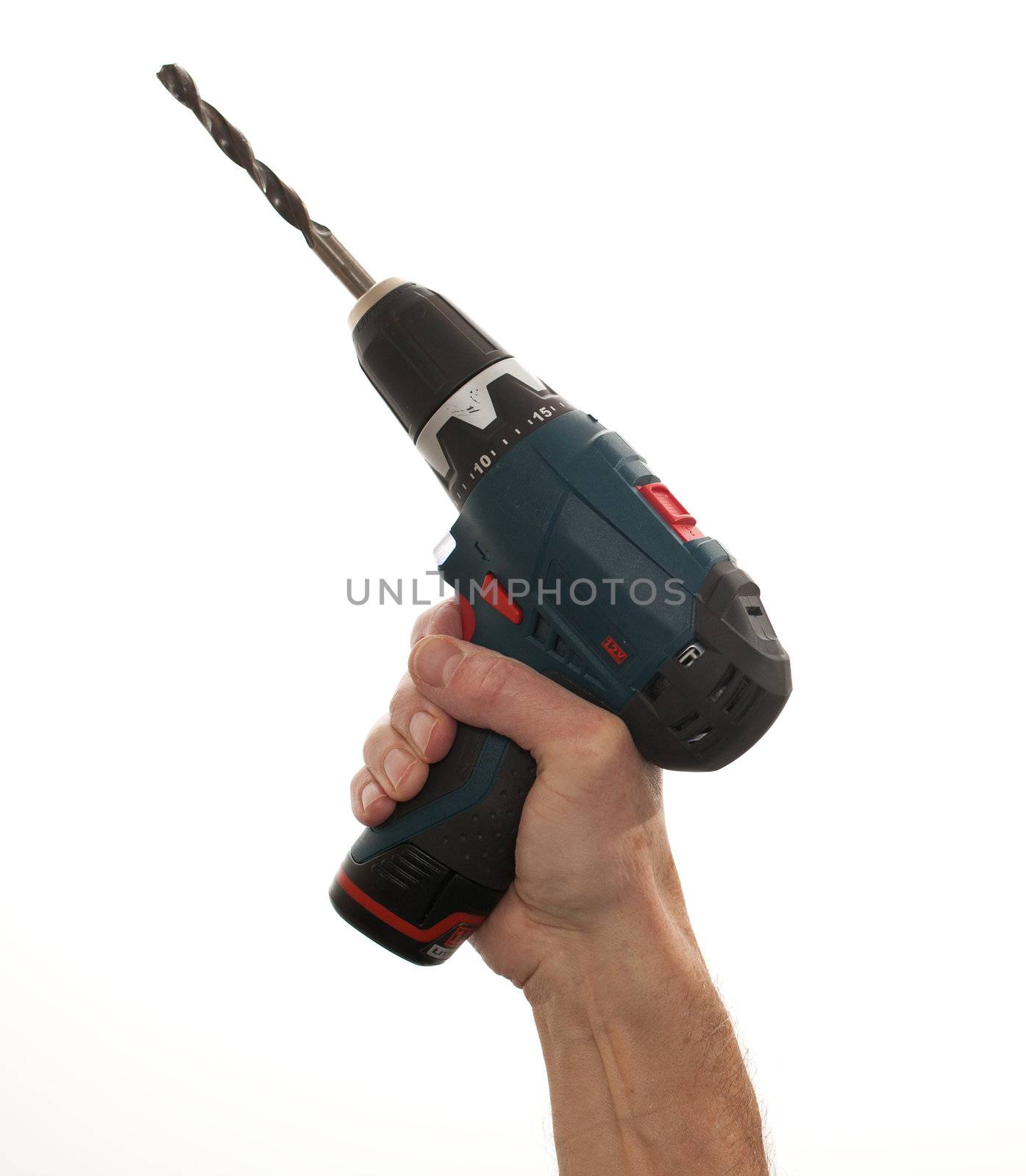 Senior males hand holding a power drill isolated against white