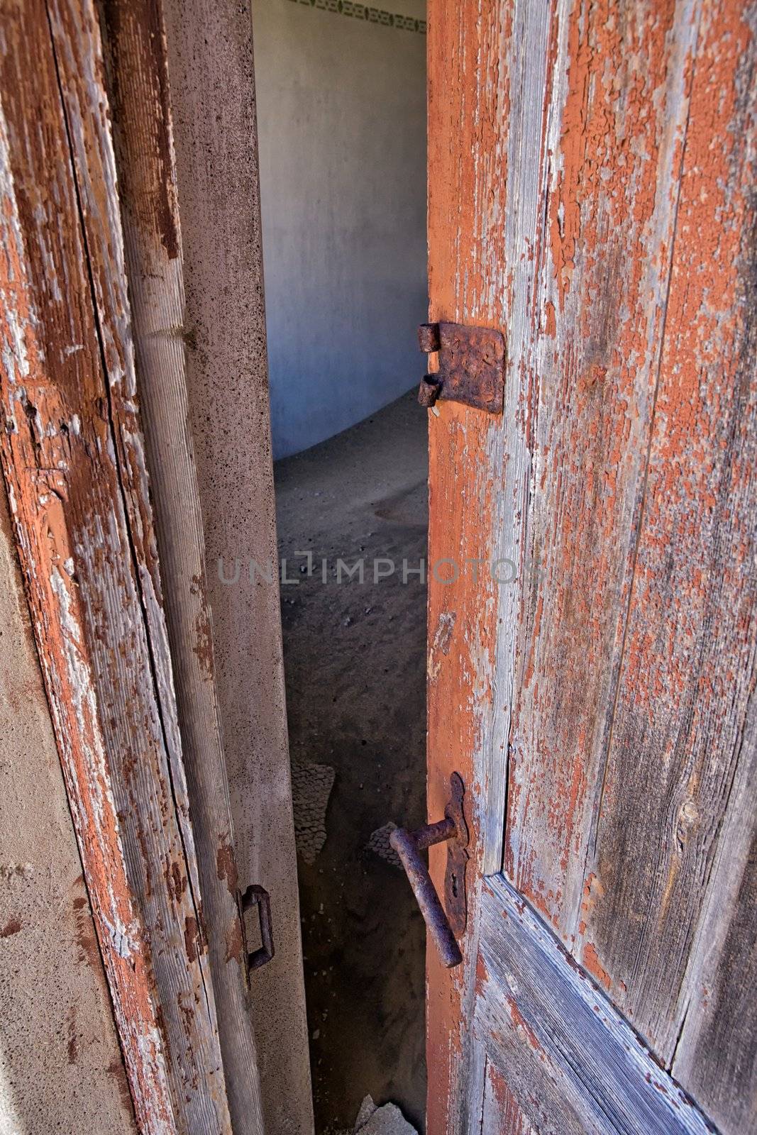 a door in kolmanskop's ghost town namibia