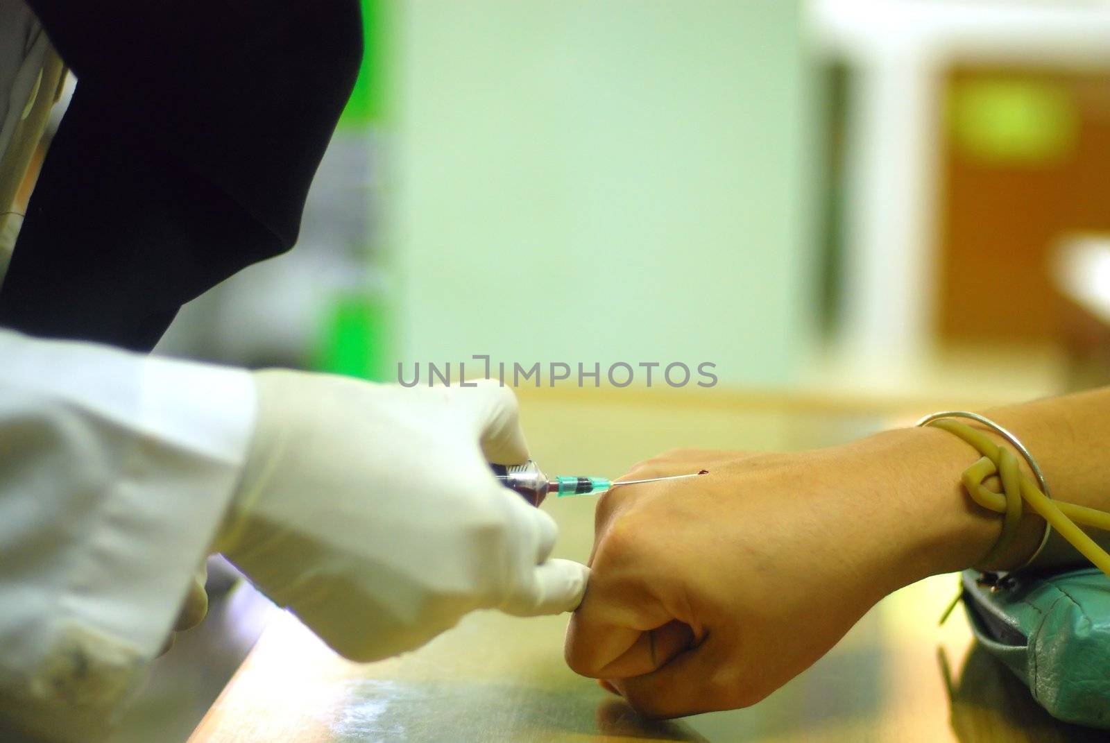 Young Woman Having Blood Test 