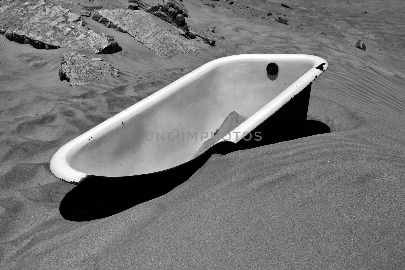 bath on a dune at kolmanskop's ghost town namibia africa