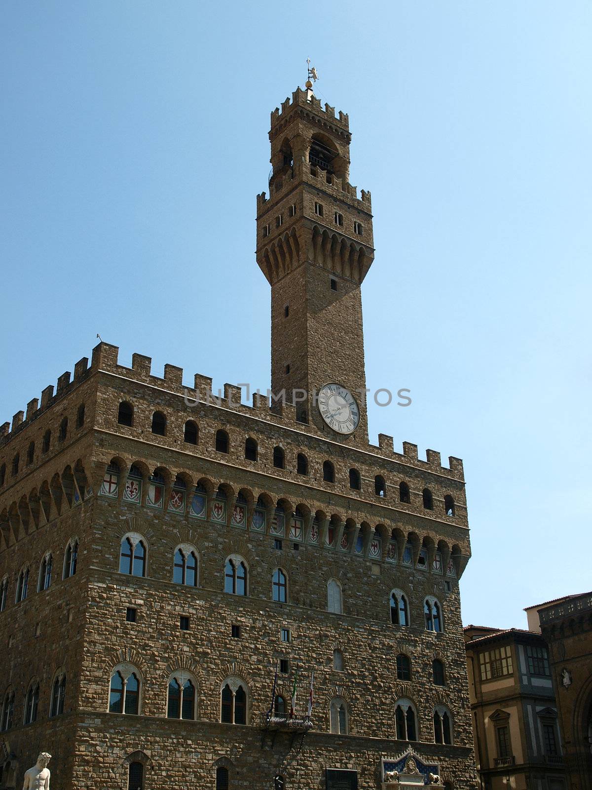 Front of Palazzo Vecchio and the clock tower on Piazza della Signoria, Florence, Tuscany