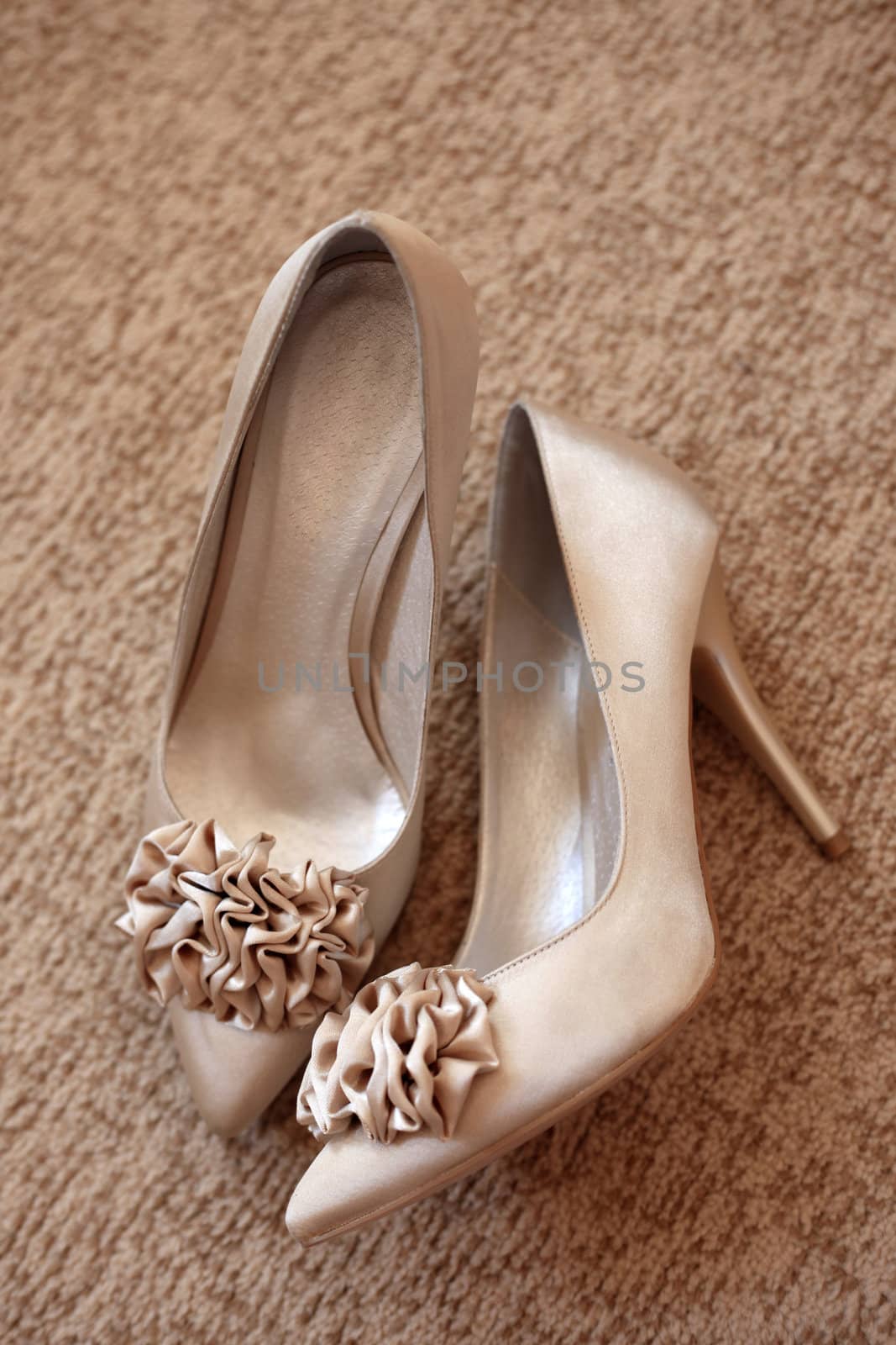 Wedding shoes with a bow and on a high heel
