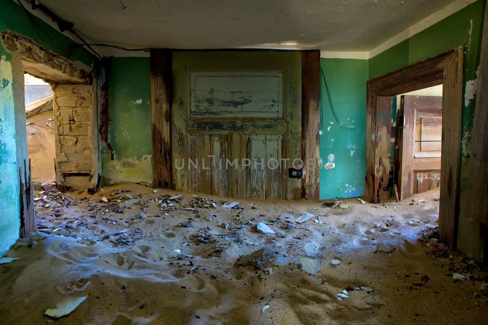 house full of sand in kolmanskop namibia