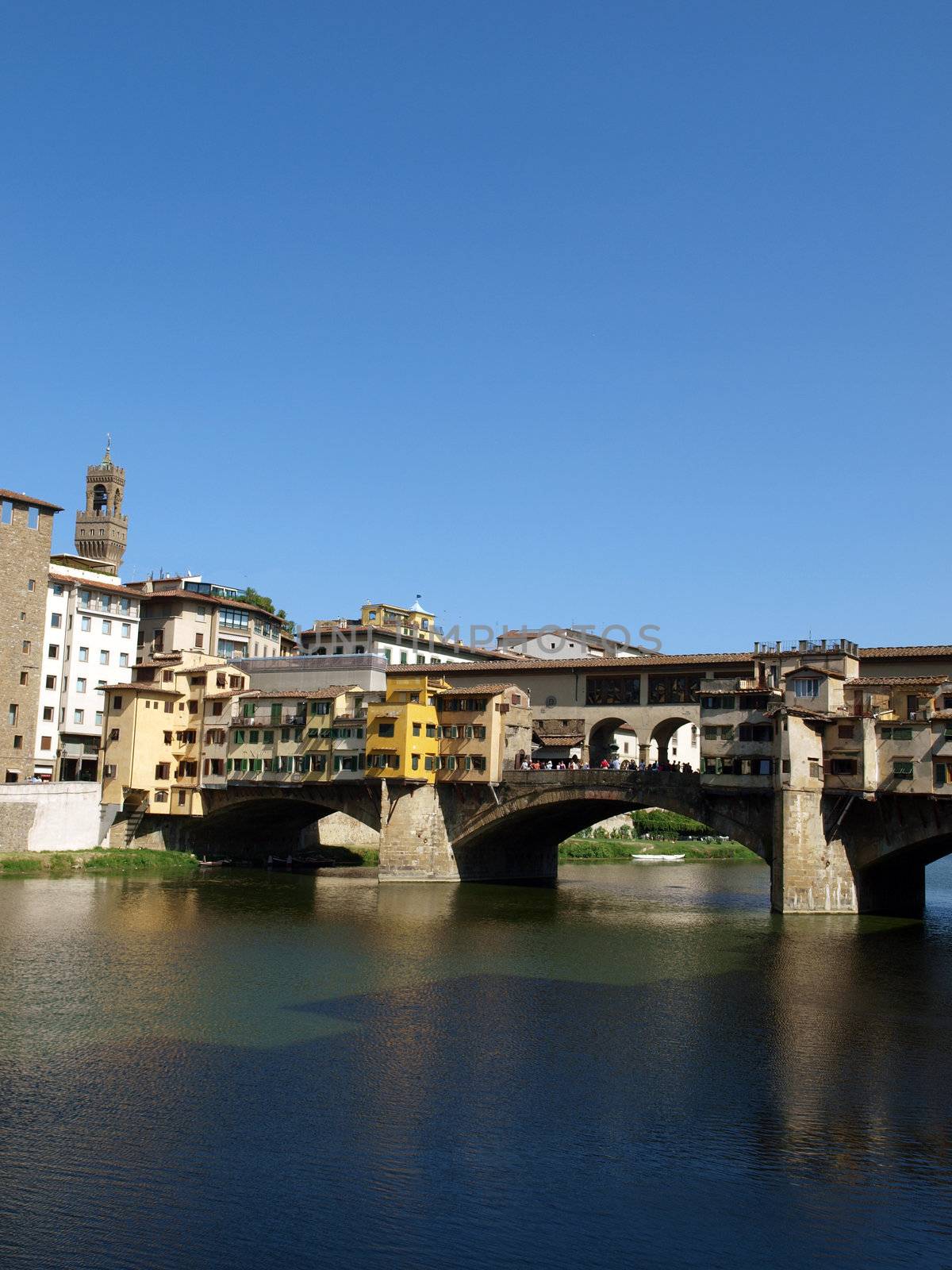 Florence - View of the Ponte Vecchio. The Ponte Vecchio /Old Bridge/ is a Medieval bridge over the Arno River, in Florence, Italy