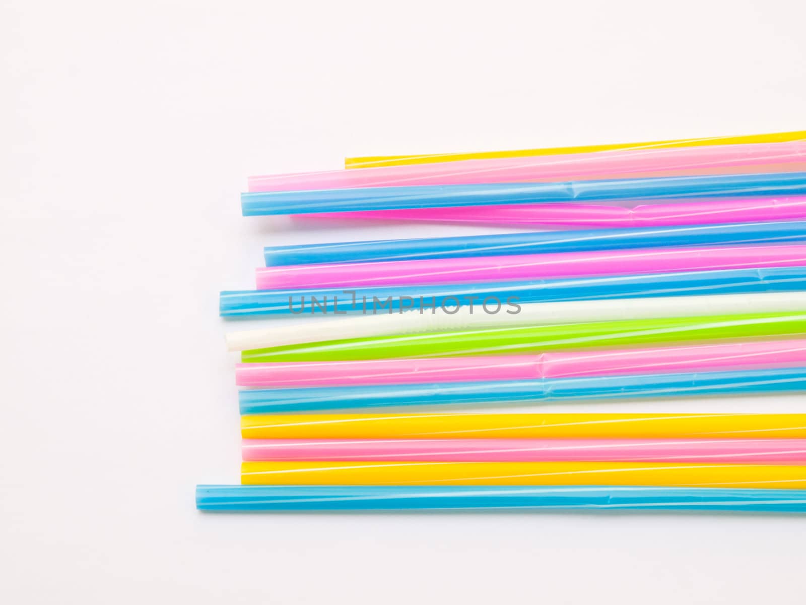 Colorful straws isolated on white back ground by gururugu
