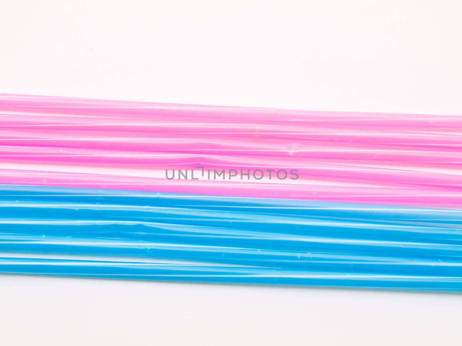 Light blue straws isolated on white back ground
