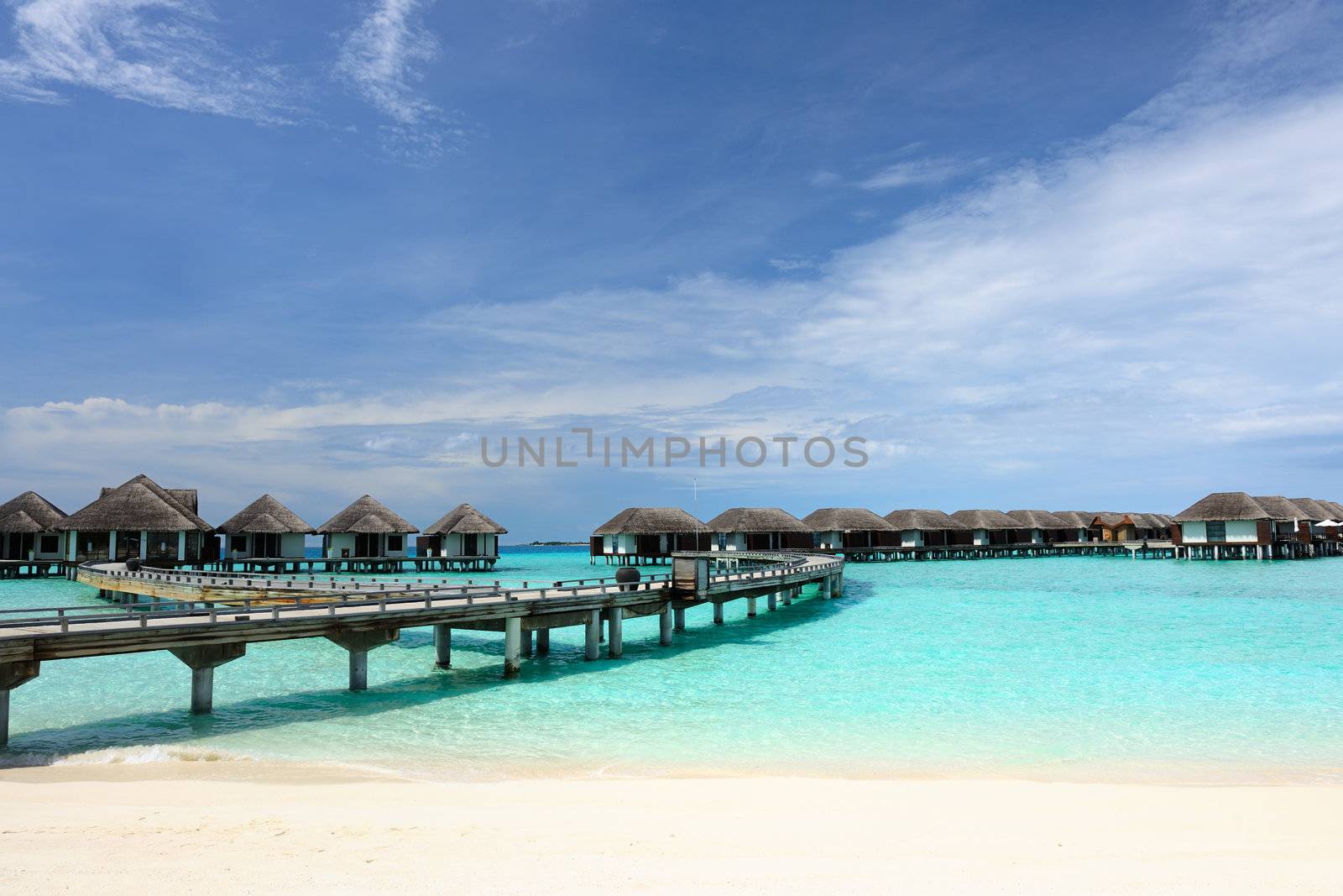 Beautiful beach with water bungalows at Maldives