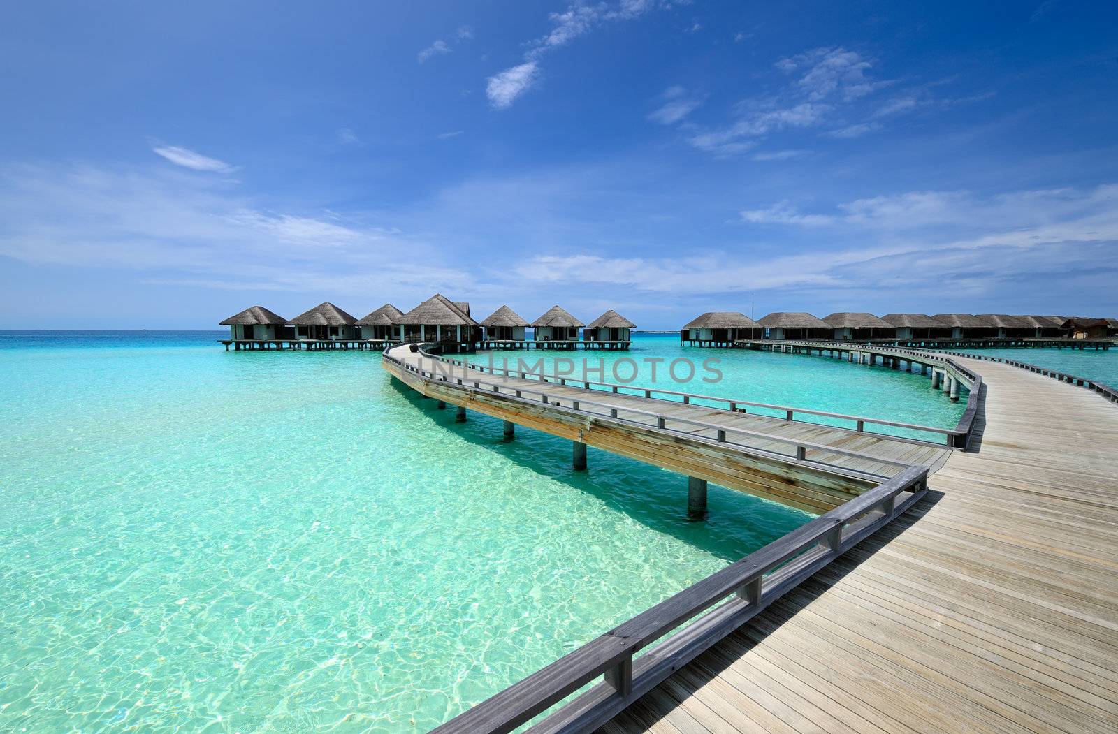 Beautiful beach with water bungalows at Maldives