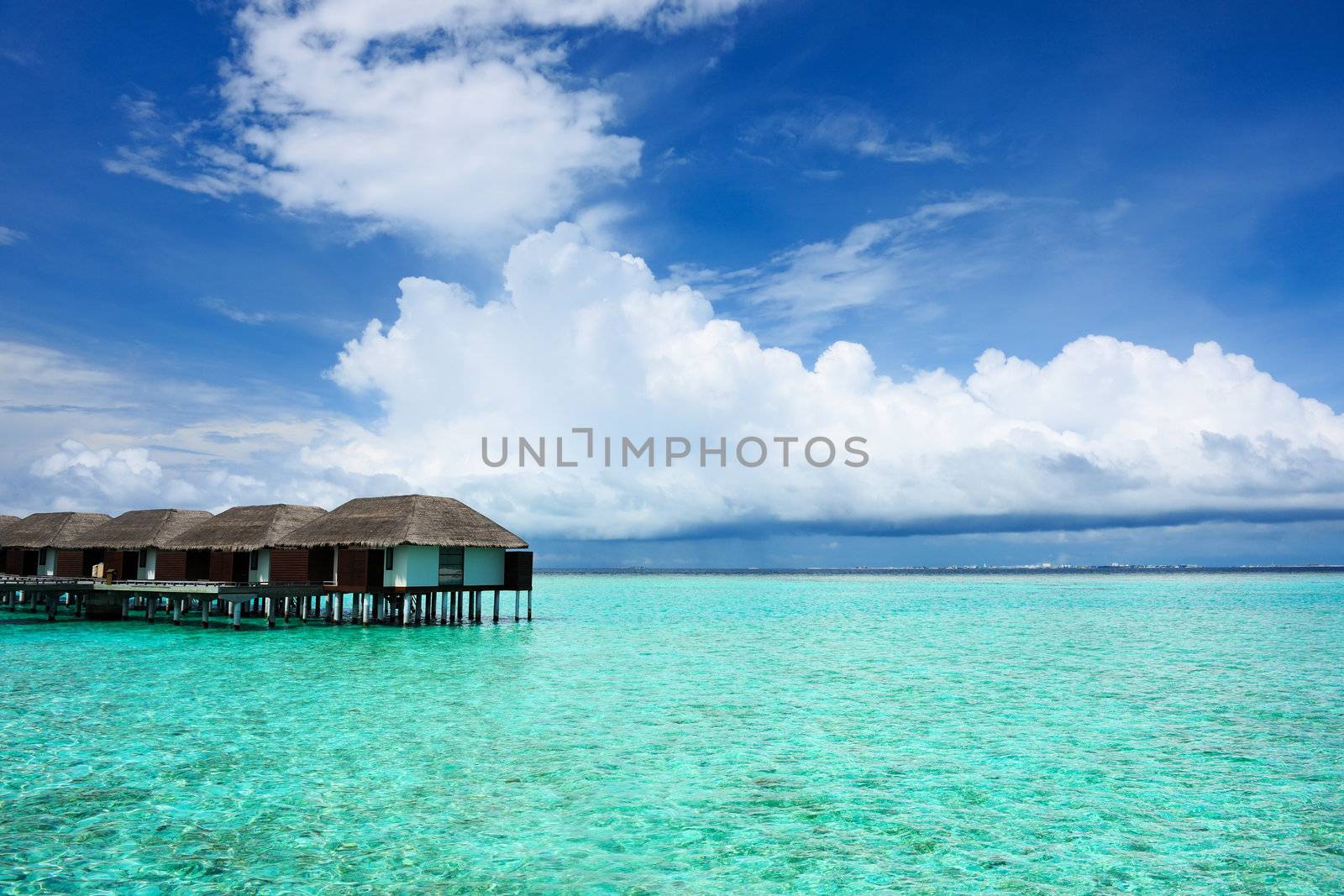 Beautiful beach with water bungalows at Maldives