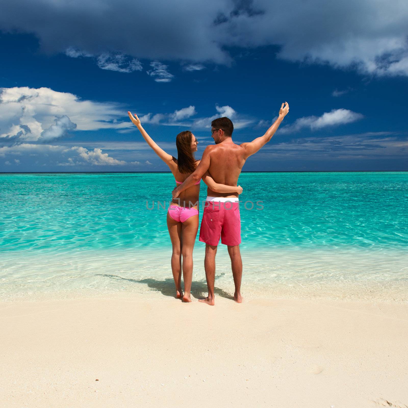 Couple on a tropical beach at Maldives