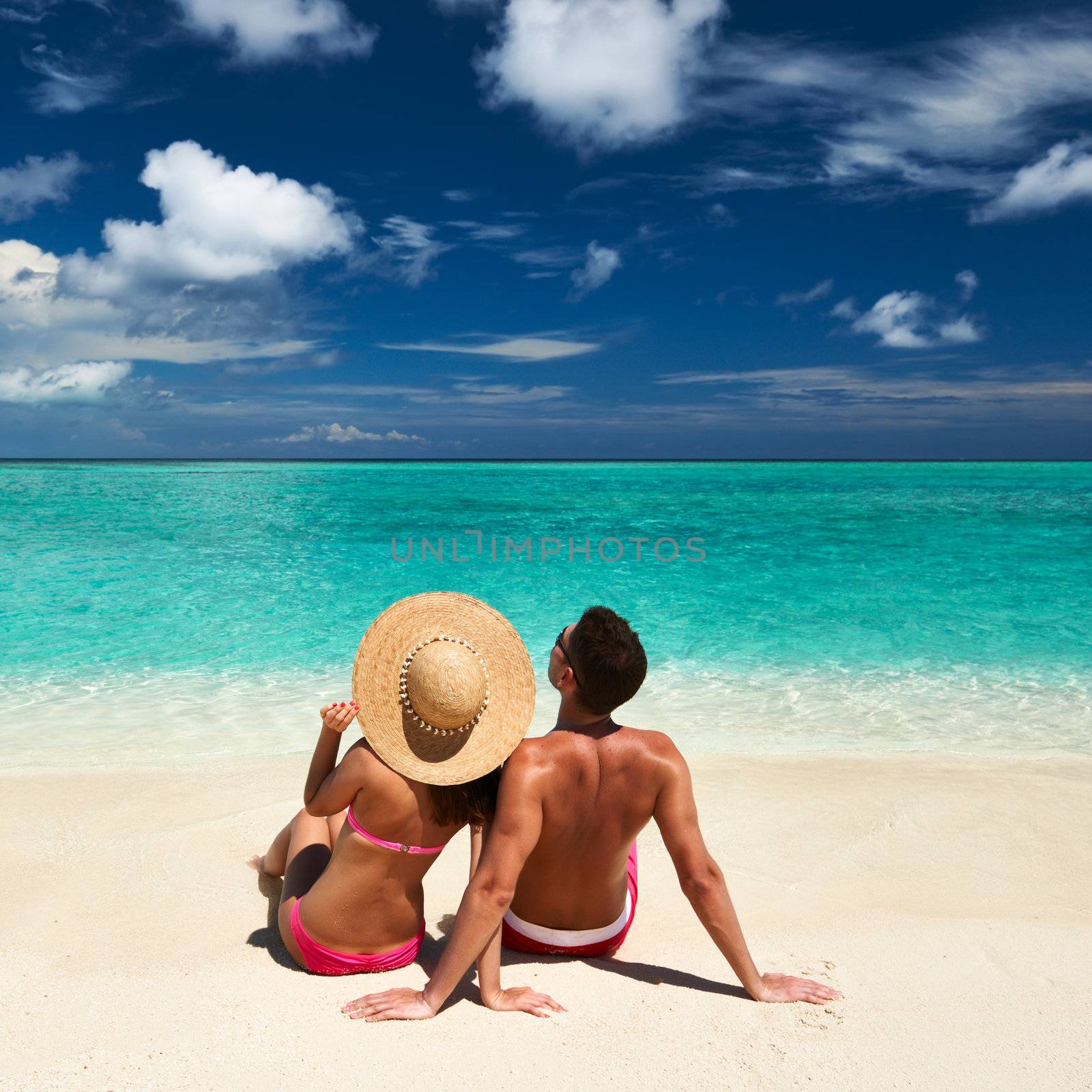 Couple on a tropical beach at Maldives