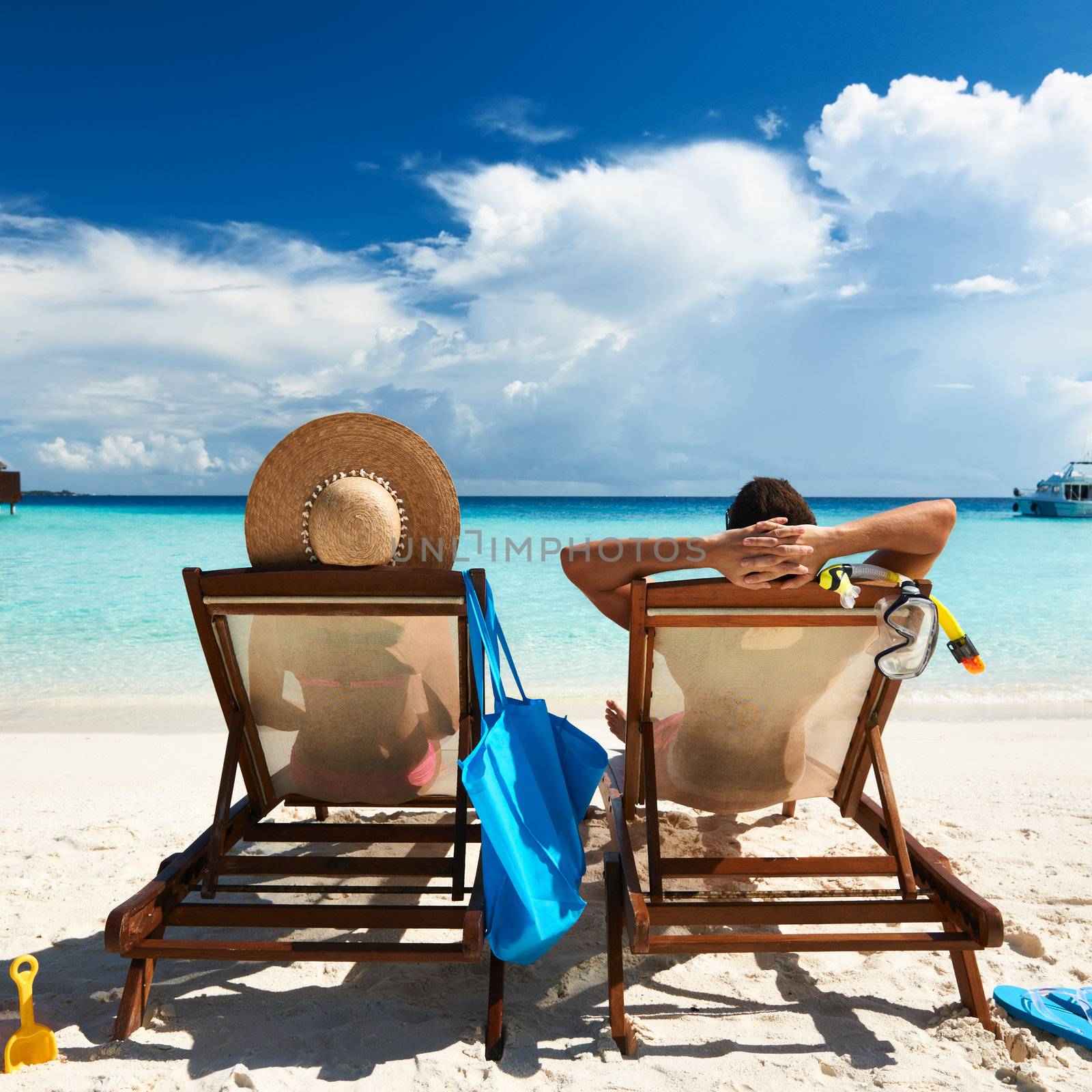 Couple on a tropical beach at Maldives