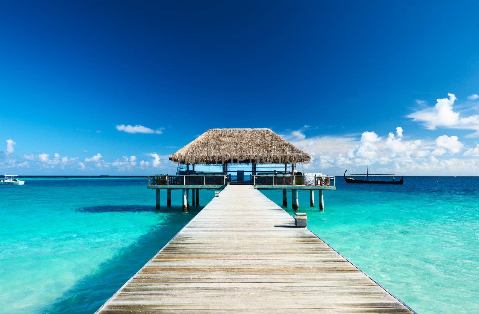 Beautiful beach with jetty at Maldives