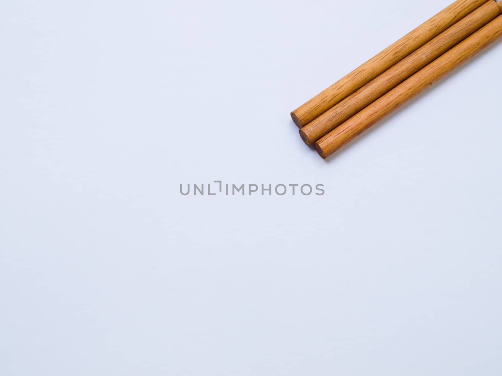 Wooden pencil isolated on white background