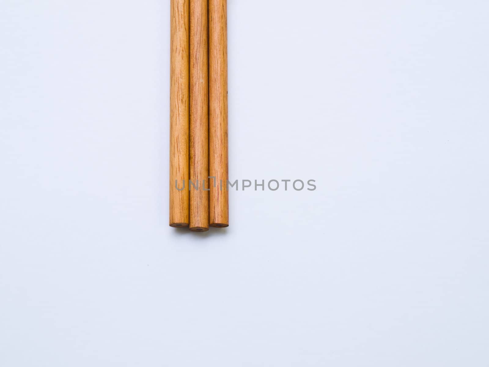 Wooden pencil isolated on white background