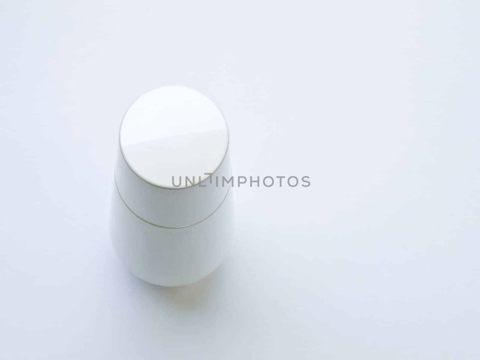 A white plastic bottle isolated on white background