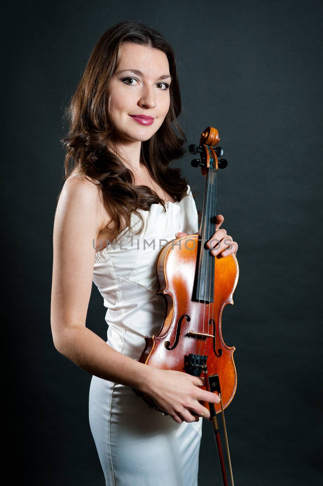 violinist on black background