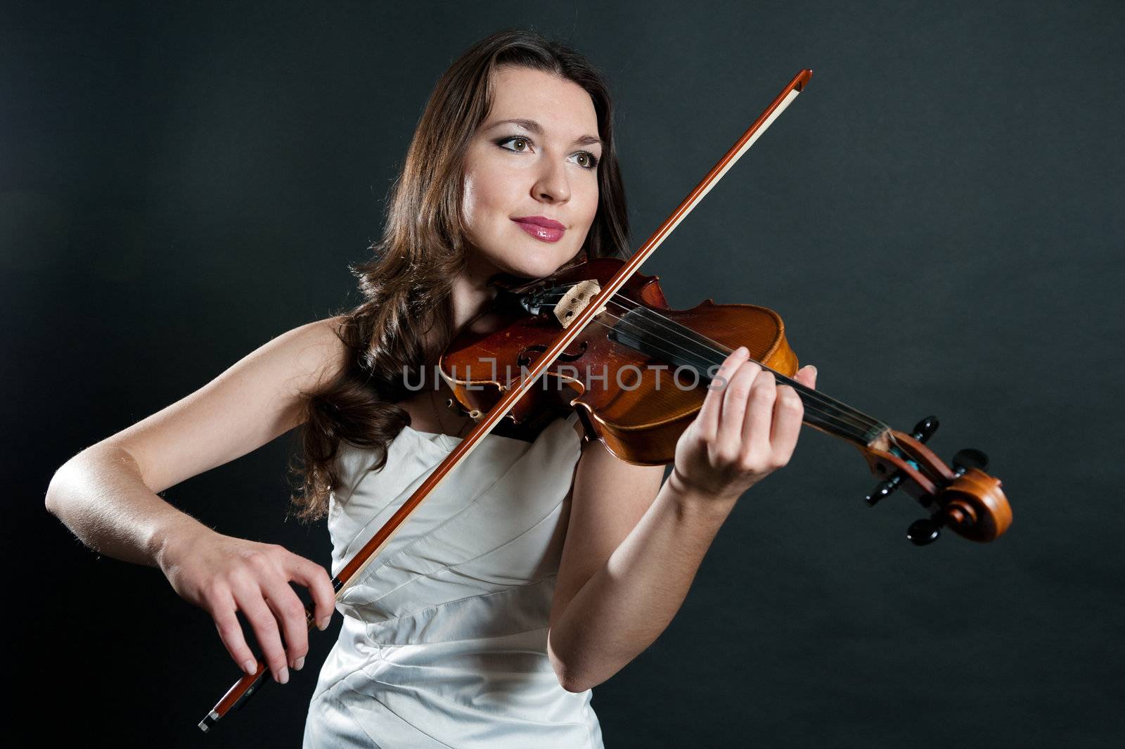 violinist on black background