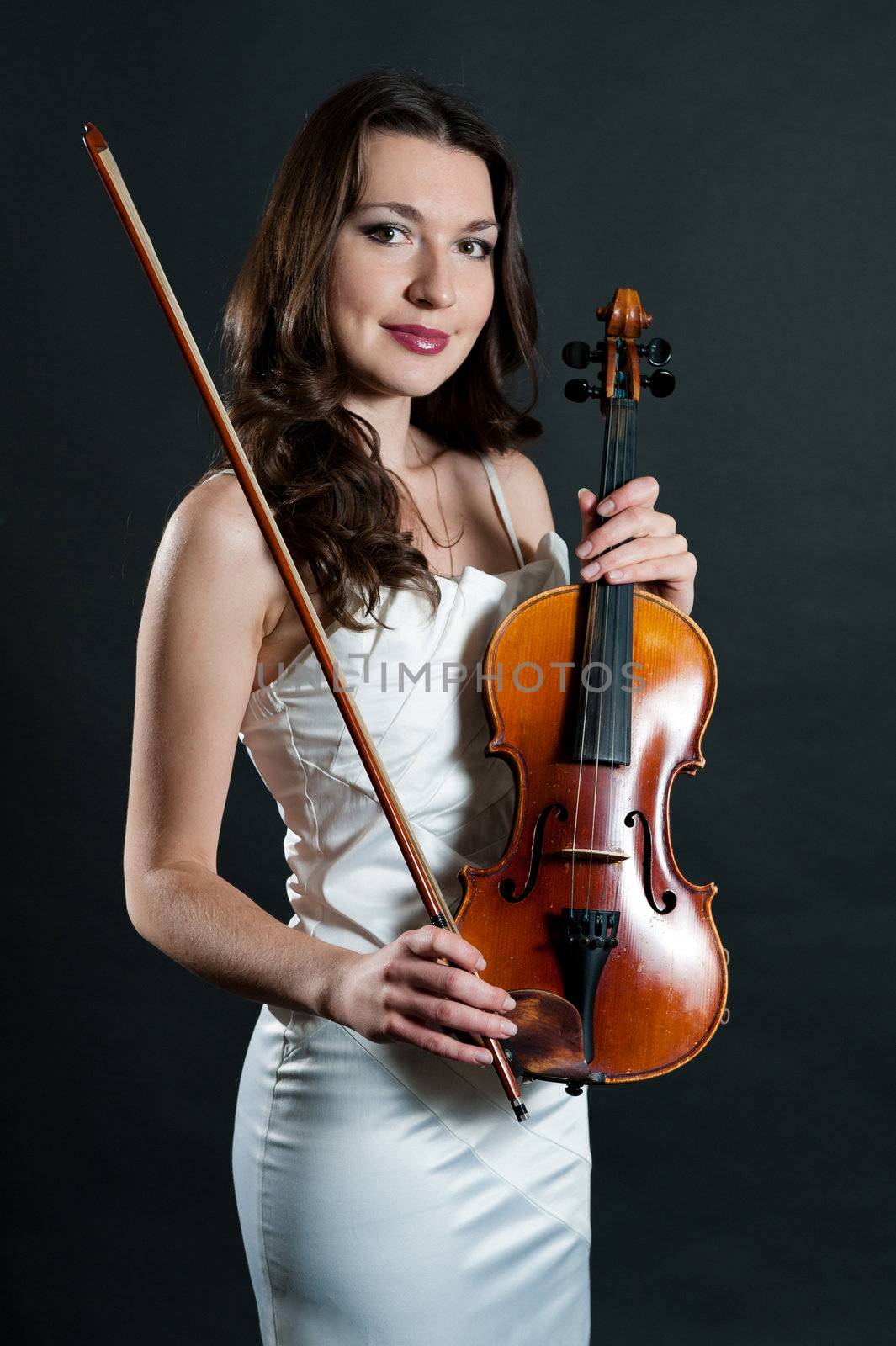 violinist on black background