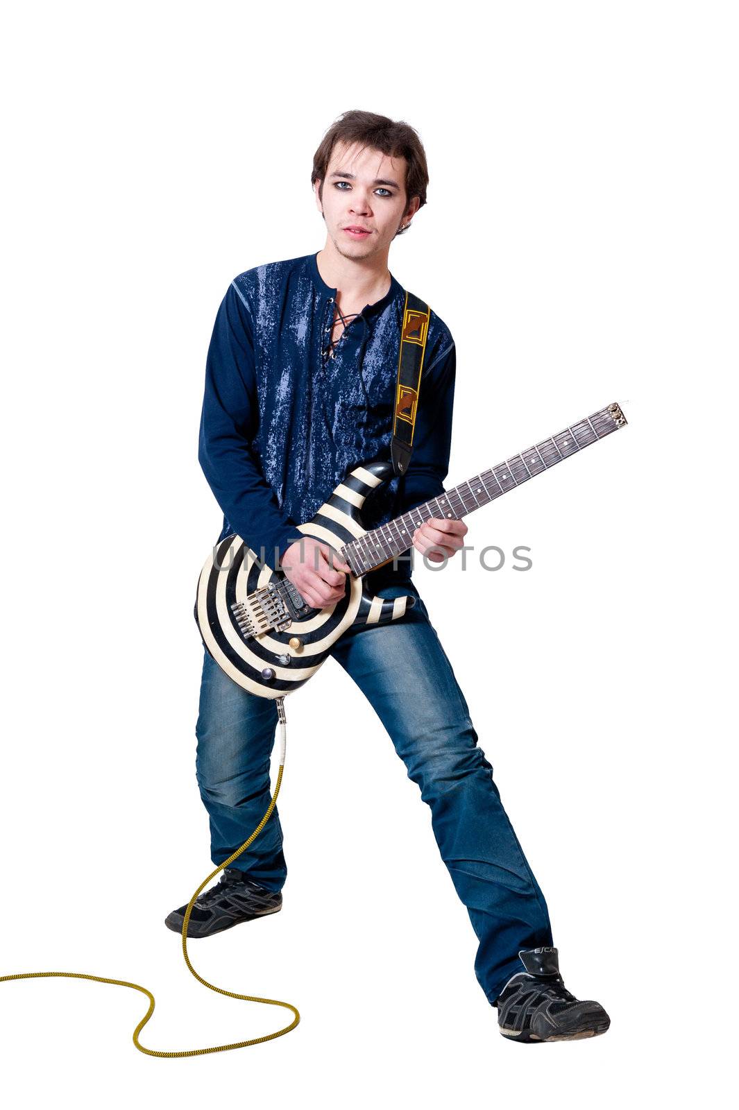 Young guitarist with electric guitar on white background