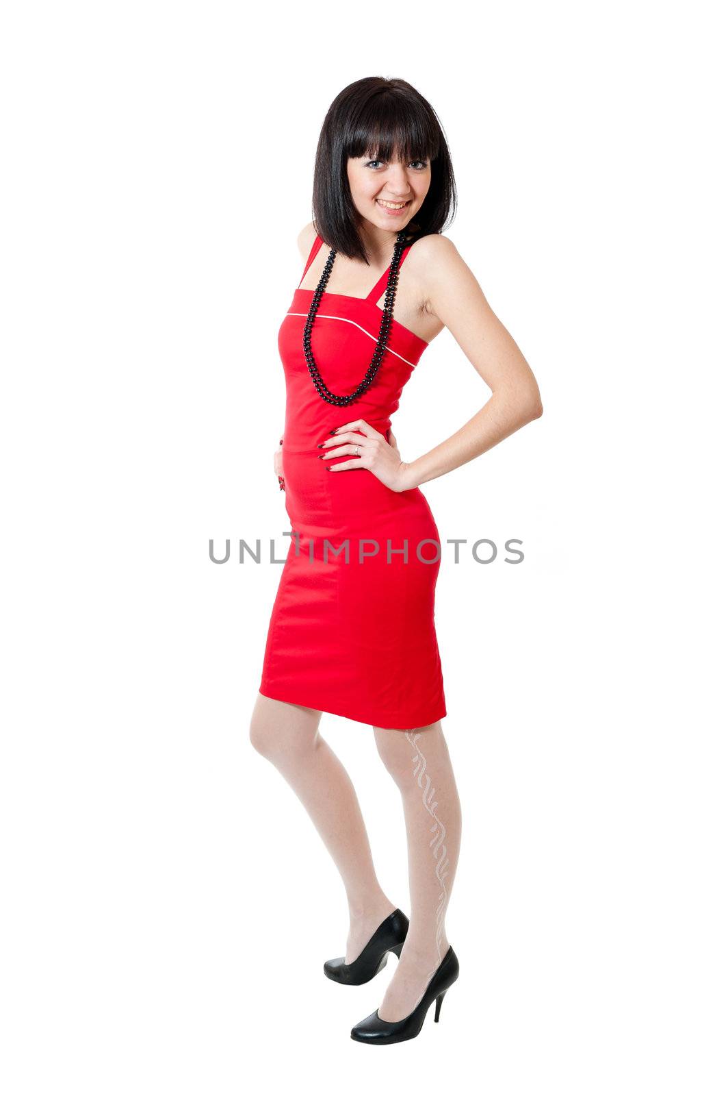 Beautiful girl in red dress isolated on white background