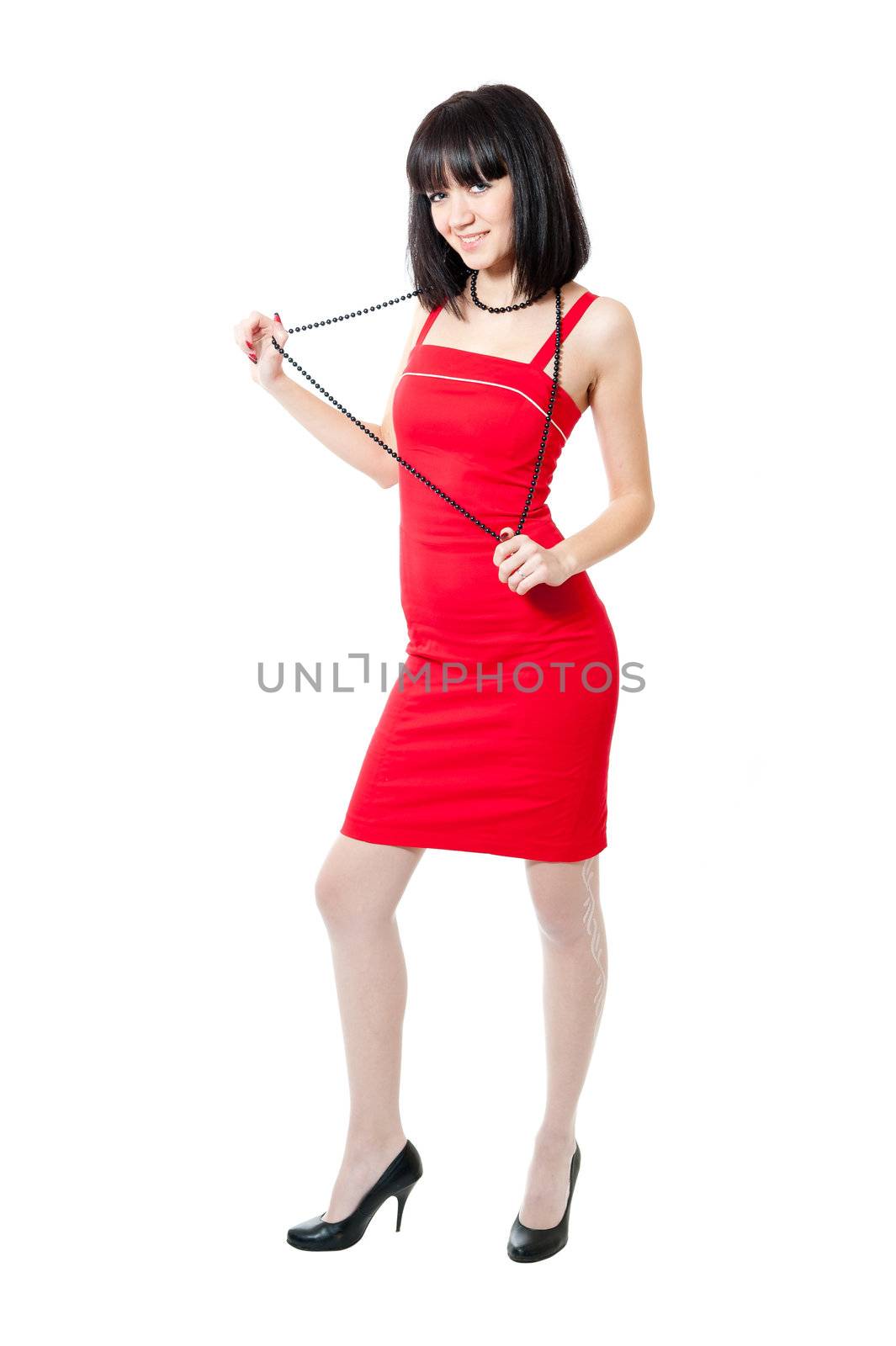 Beautiful girl in red dress isolated on white background
