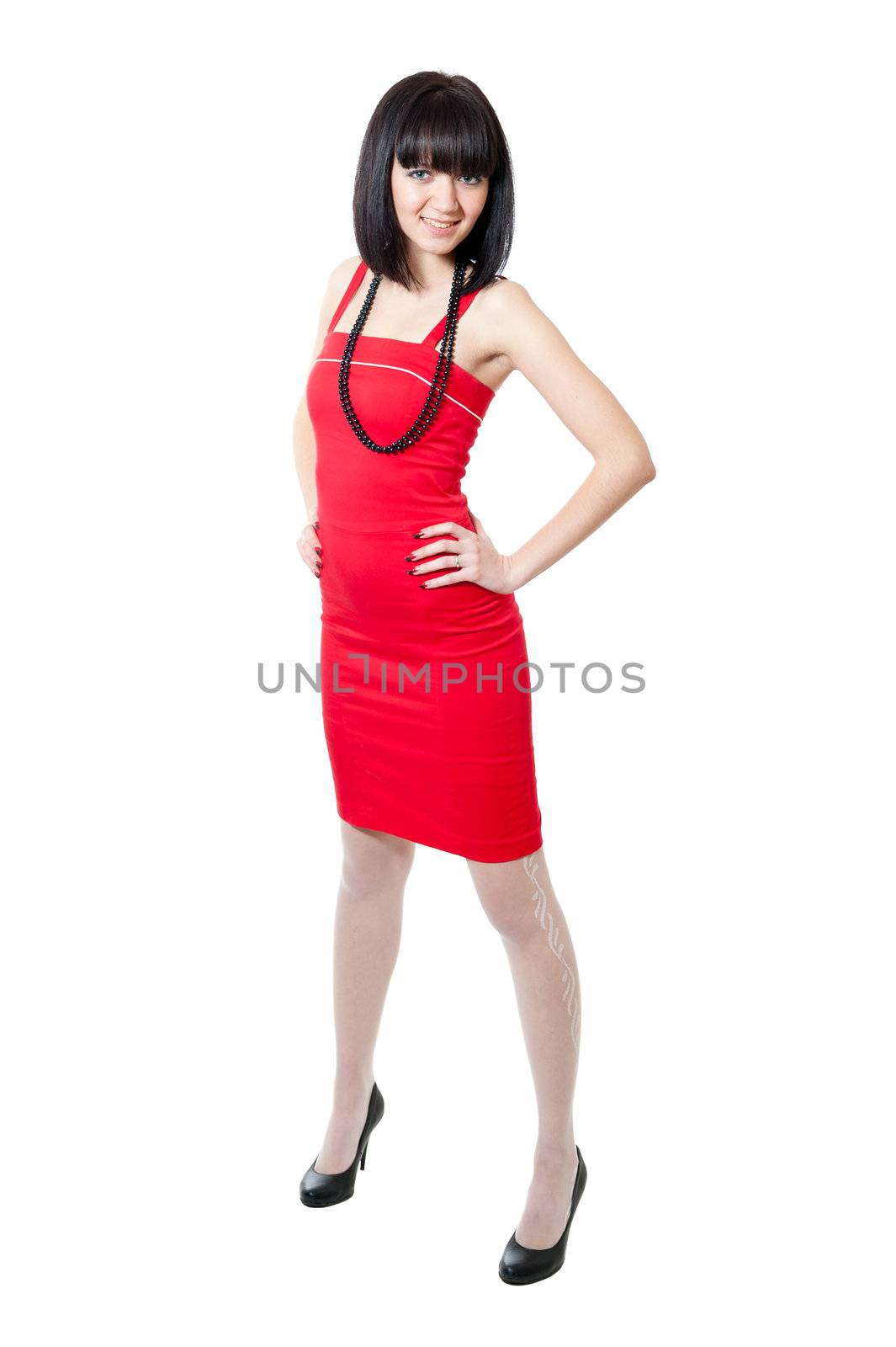 Beautiful girl in red dress isolated on white background
