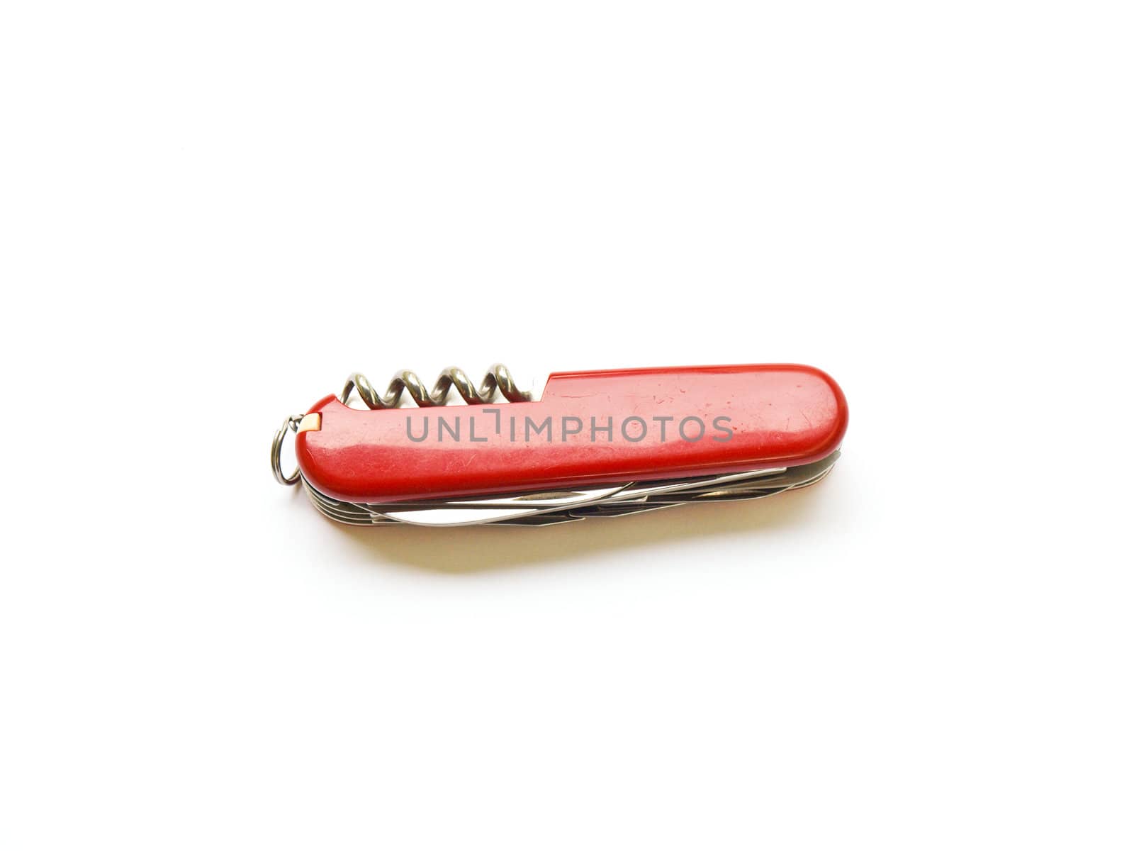 red swiss army knife isolated on white background